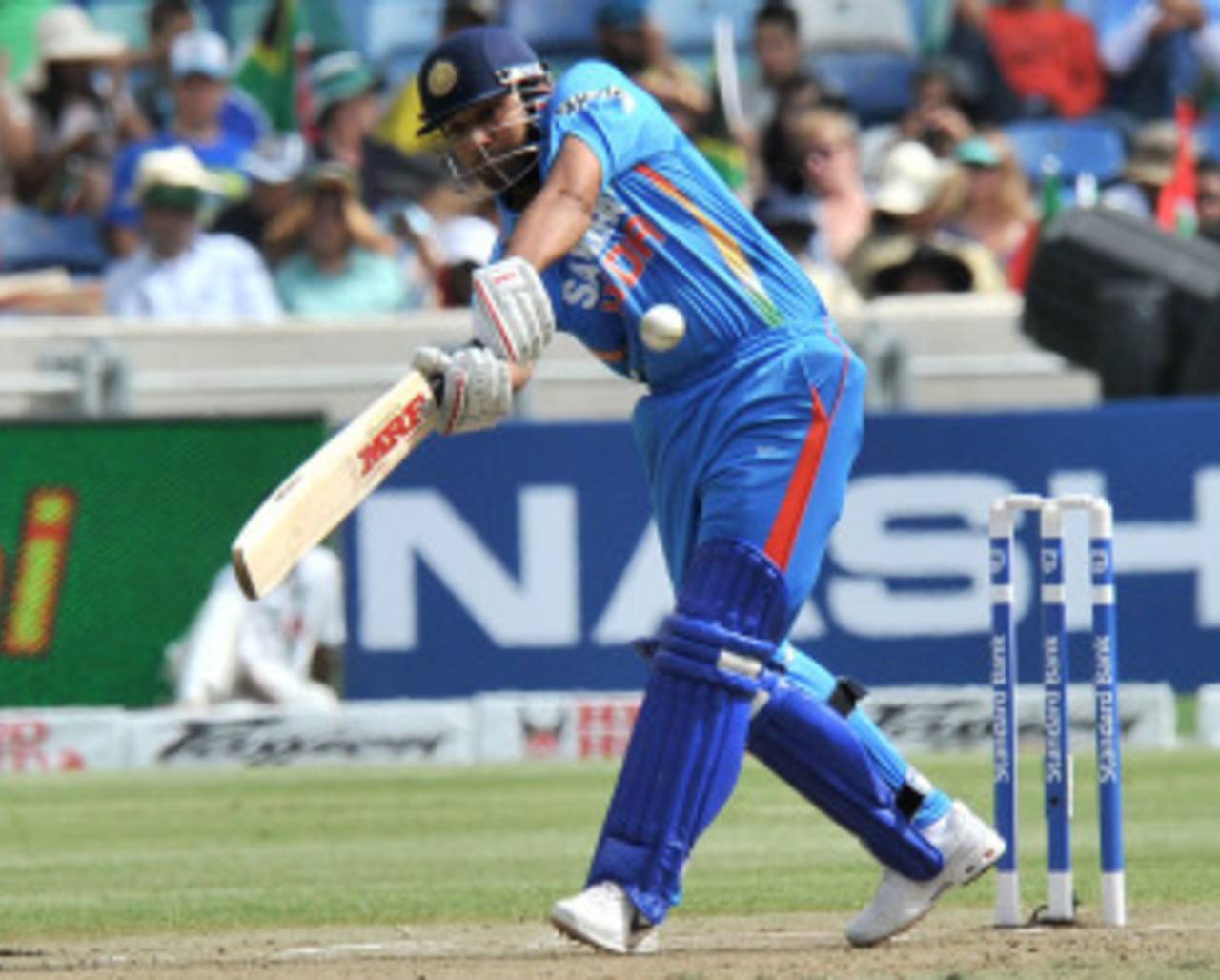 Rohit Sharma hits one to the leg side during his 53 off 34 balls, South Africa v India, only Twenty20, Durban