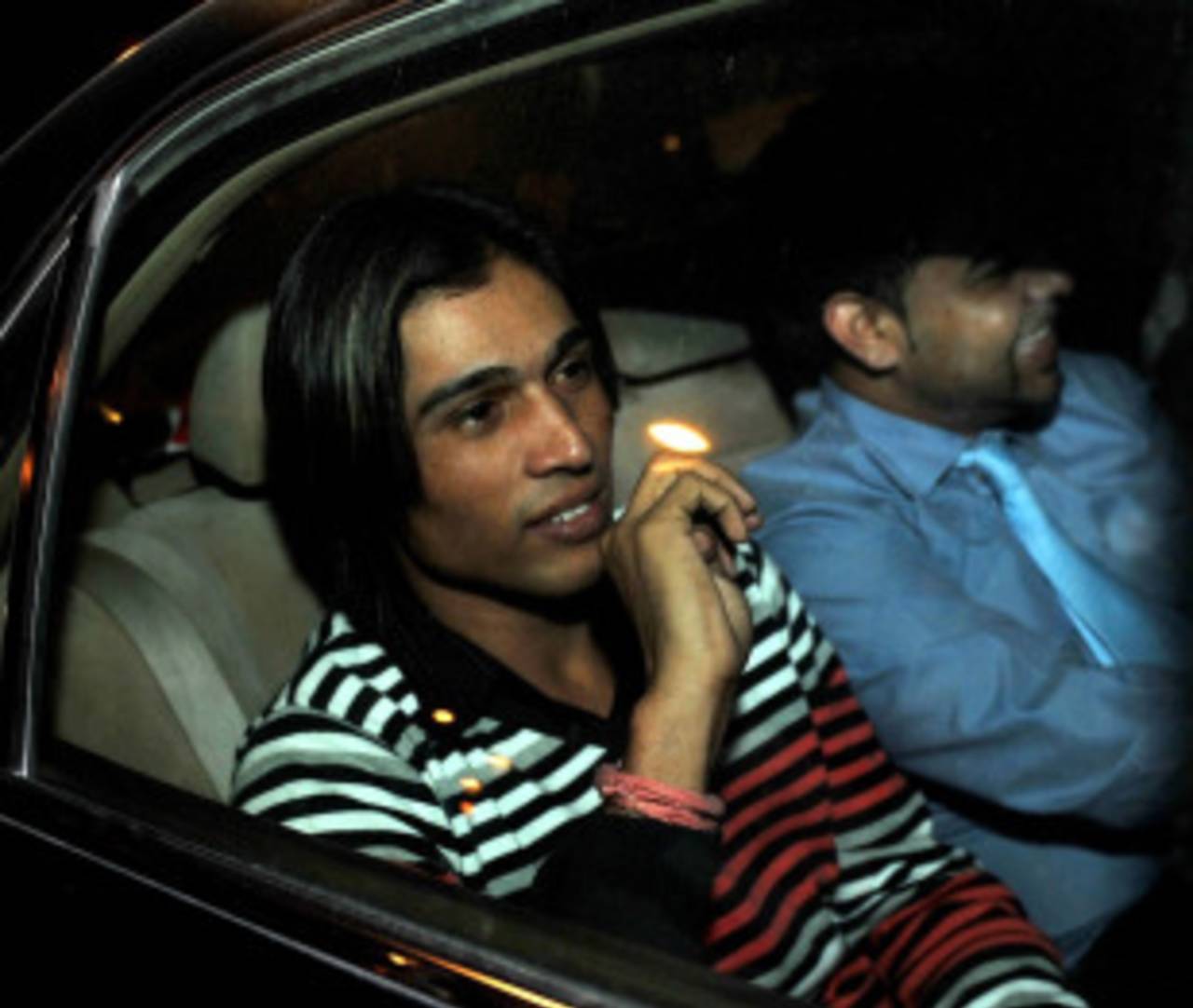 Mohammad Amir leaves after the hearing, Doha, 11 January, 20100