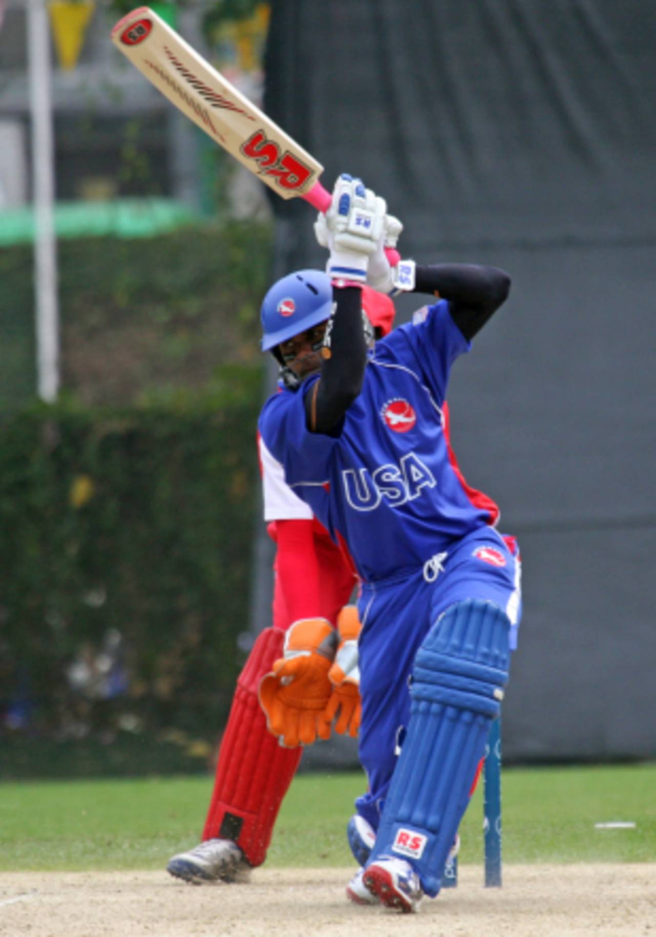 Steve Massiah drives through the covers during his match-winning innings, Hong Kong v United States of America, WCL Div. Three, Kowloon, January 22, 2011