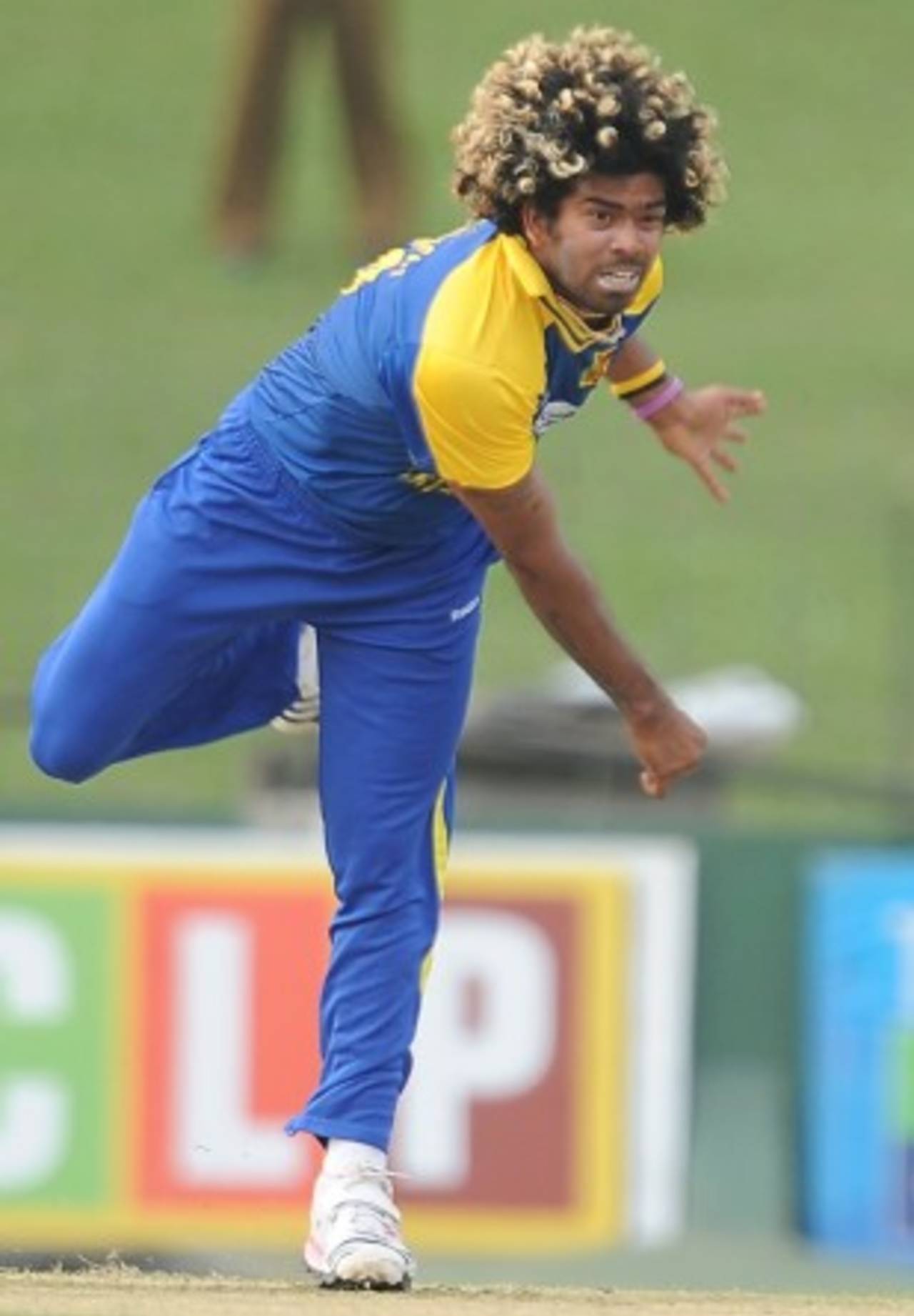Lasith Malinga with a head full of colourful curls, Sri Lanka v West Indies, 1st ODI, SSC, Colombo, January 31, 2011
