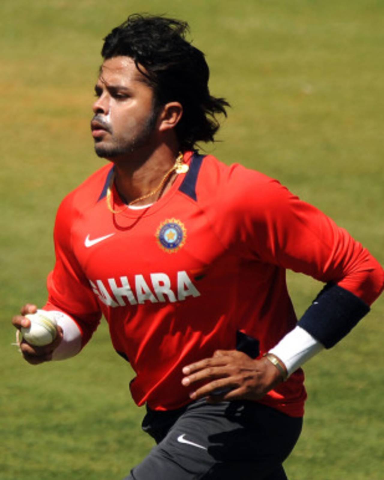 Sreesanth runs in to bowl during India's practice session, Bangalore, February 10, 2011