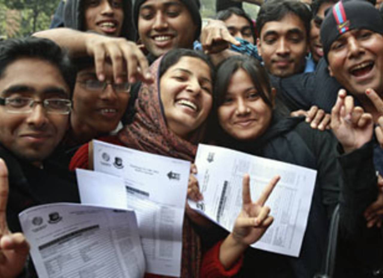 Fans show their ticket vouchers at the World Cup ticket counters, Dhaka, January 3, 2011