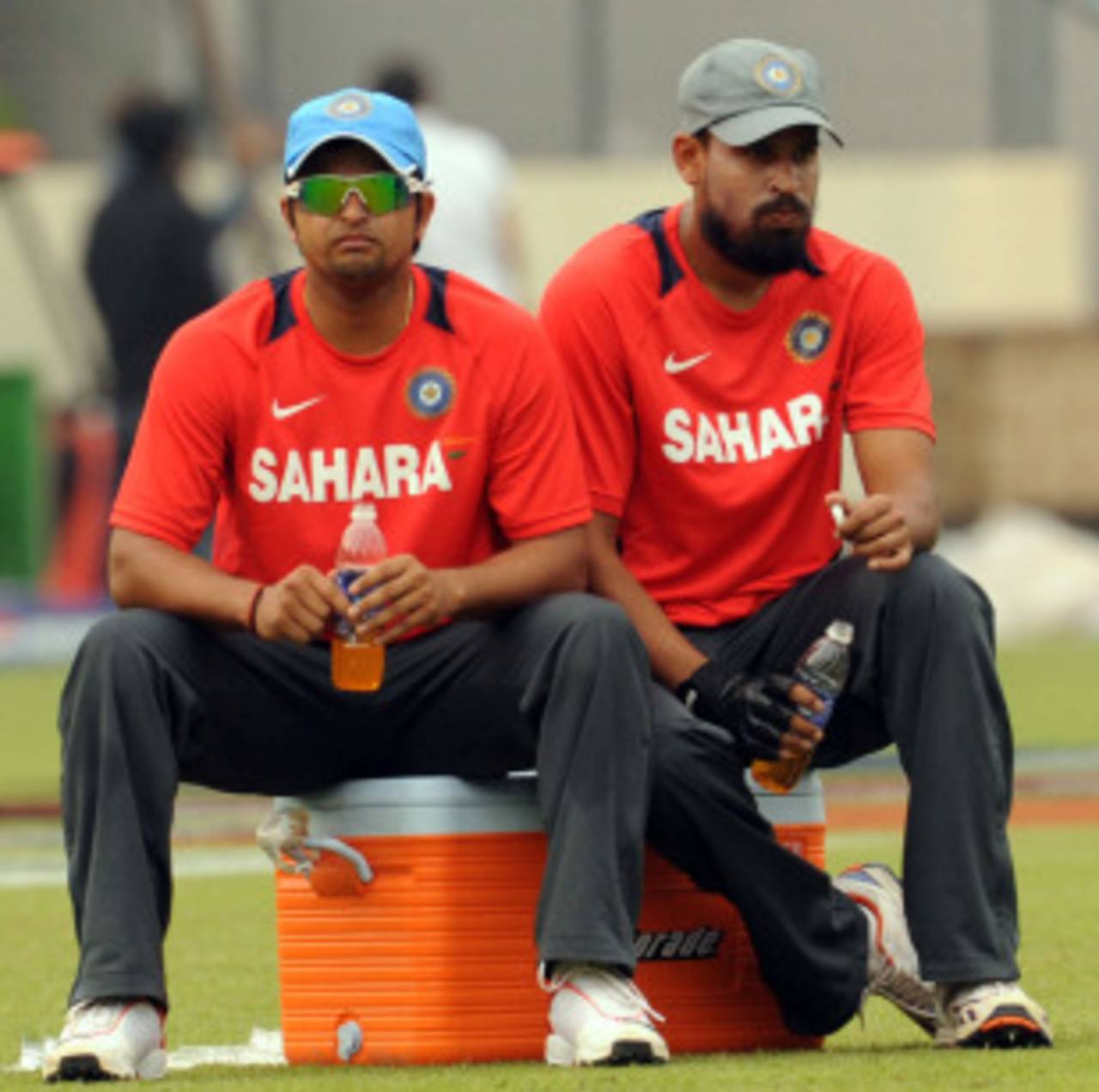 Suresh Raina and Yusuf Pathan take a breather during practice, Shere Bangla Stadium, Mirpur, February 18, 2011