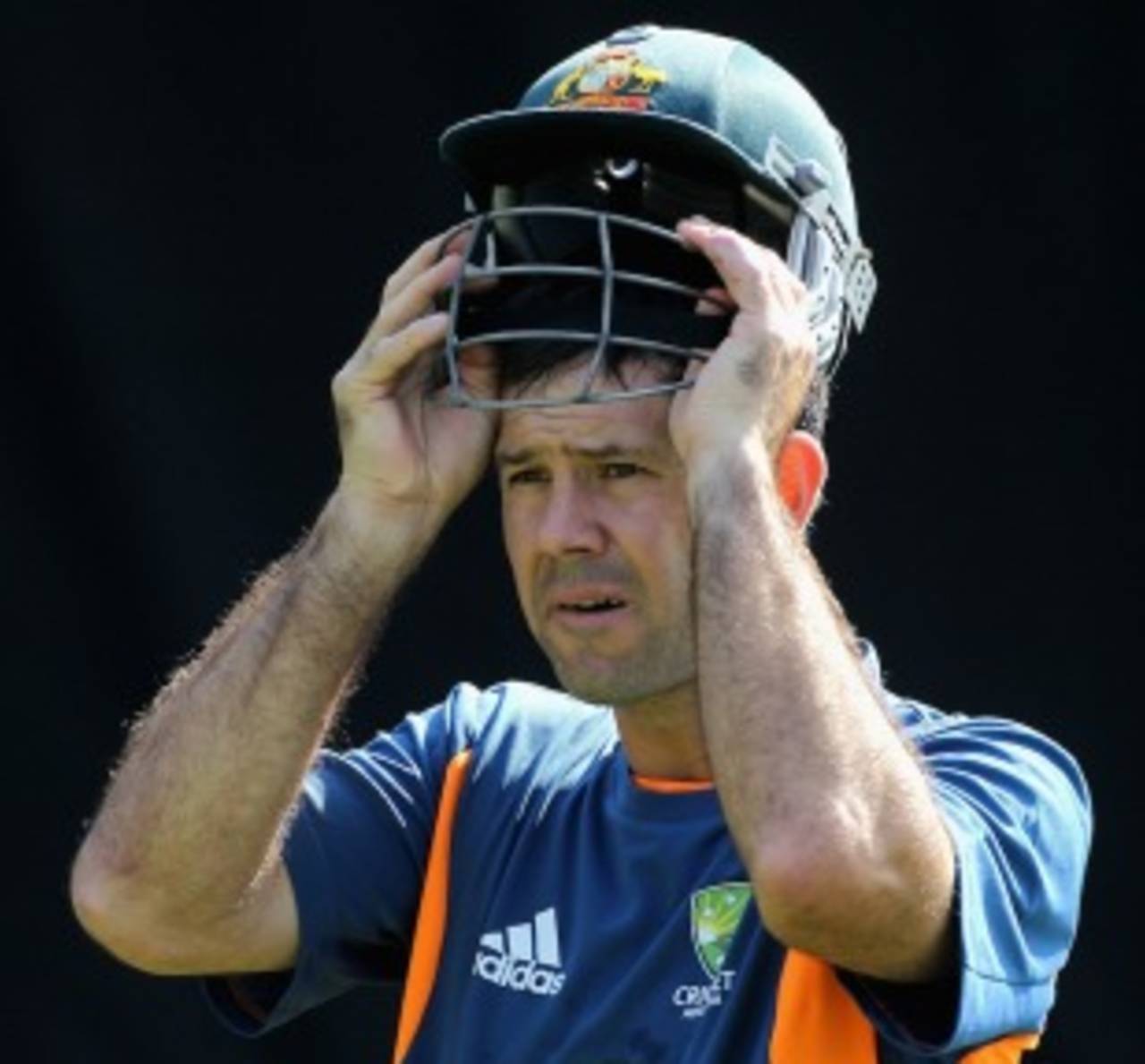 Ricky Ponting puts on his helmet during a net session, Ahmedabad, World Cup 2011, February 19, 2011