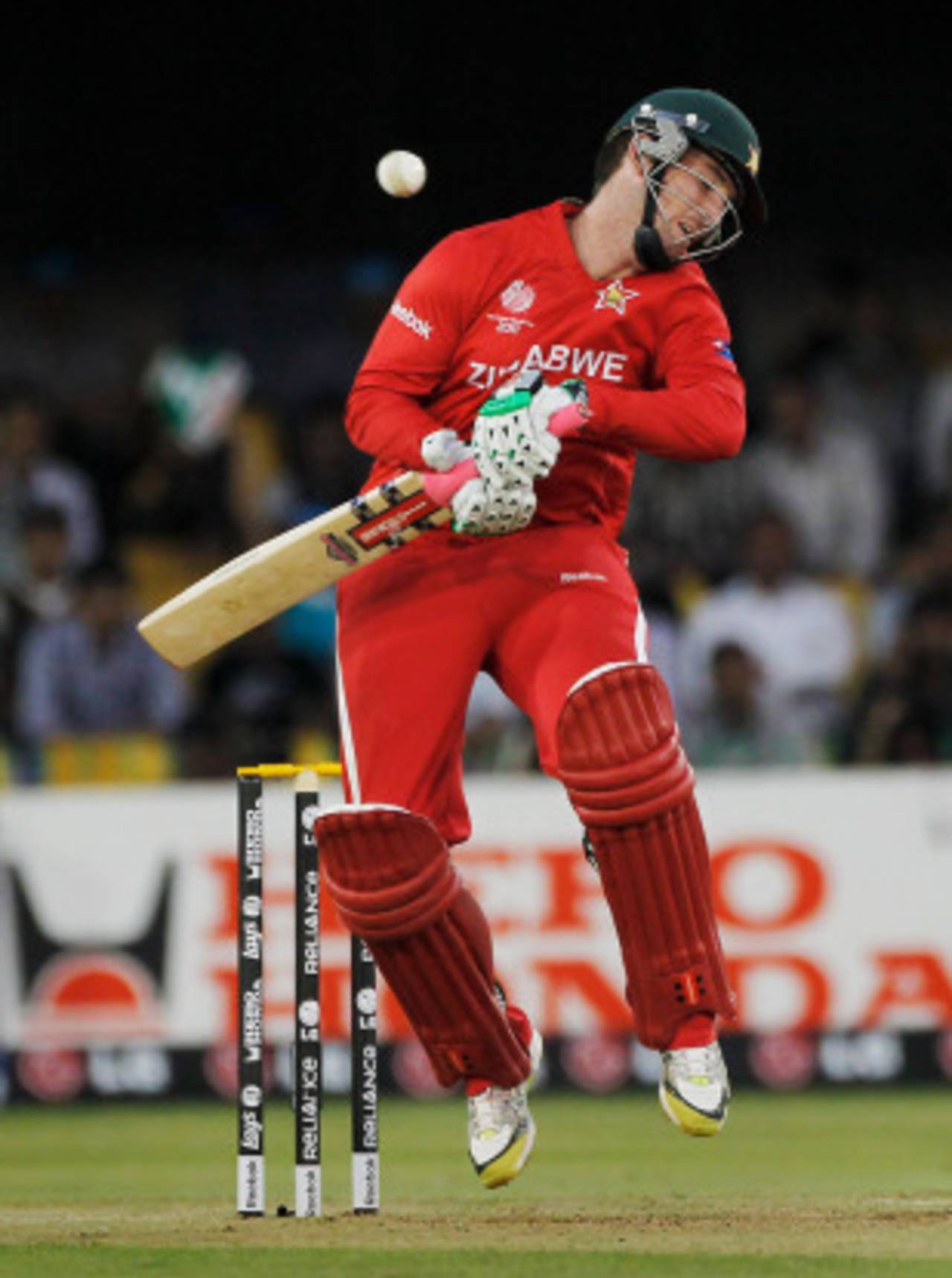 Brendan Taylor sways out of the way of a Shaun Tait bouncer, Australia v Zimbabwe, Group A, World Cup 2011, Ahmedabad, February 21, 2011