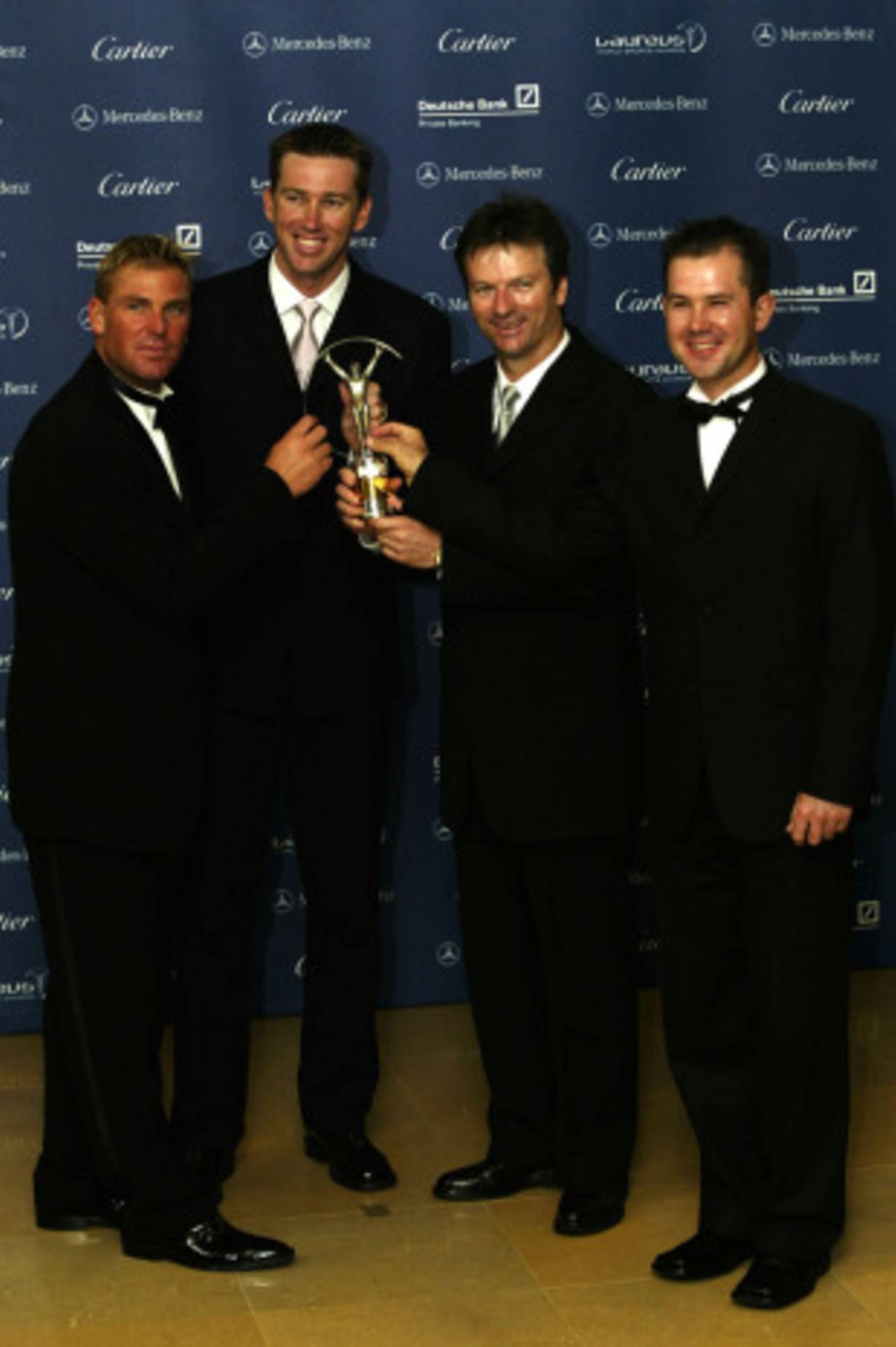 Shane Warne, Glenn McGrath, Steve Waugh and Ricky Ponting with the Laureus Sports Team of the Year trophy, Monte Carlo, May 14, 2002
