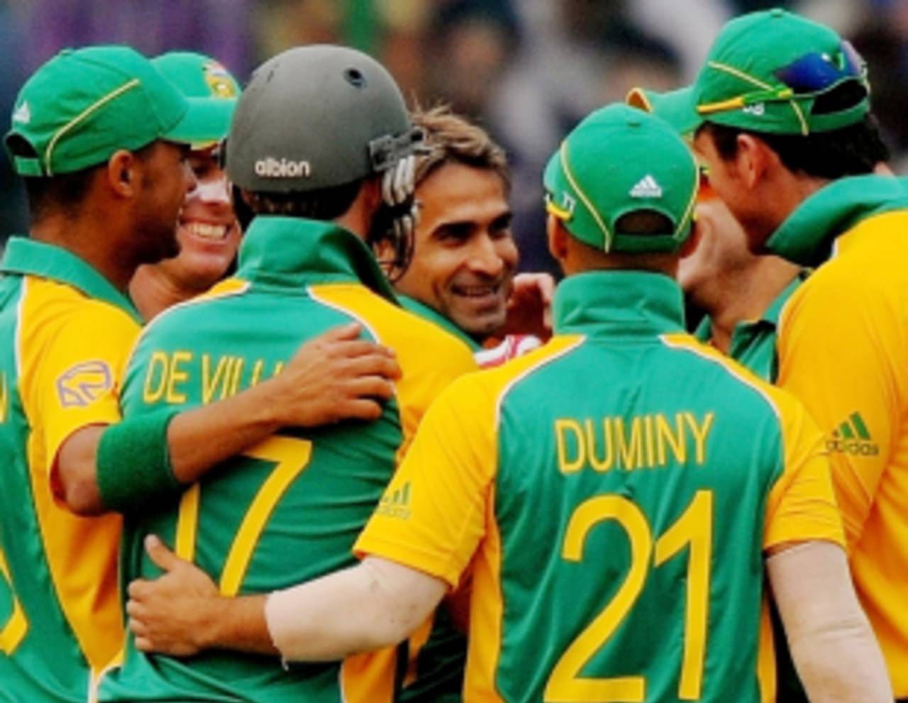 Imran Tahir is mobbed by his team-mates after picking up his first international wicket, South Africa v West Indies, World Cup, Group B, Delhi, February 24, 2011