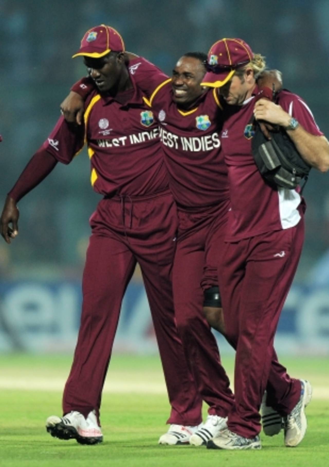 Dwayne Bravo was helped from the field after injuring his knee, South Africa v West Indies, World Cup, Group B, Delhi, February 24, 2011