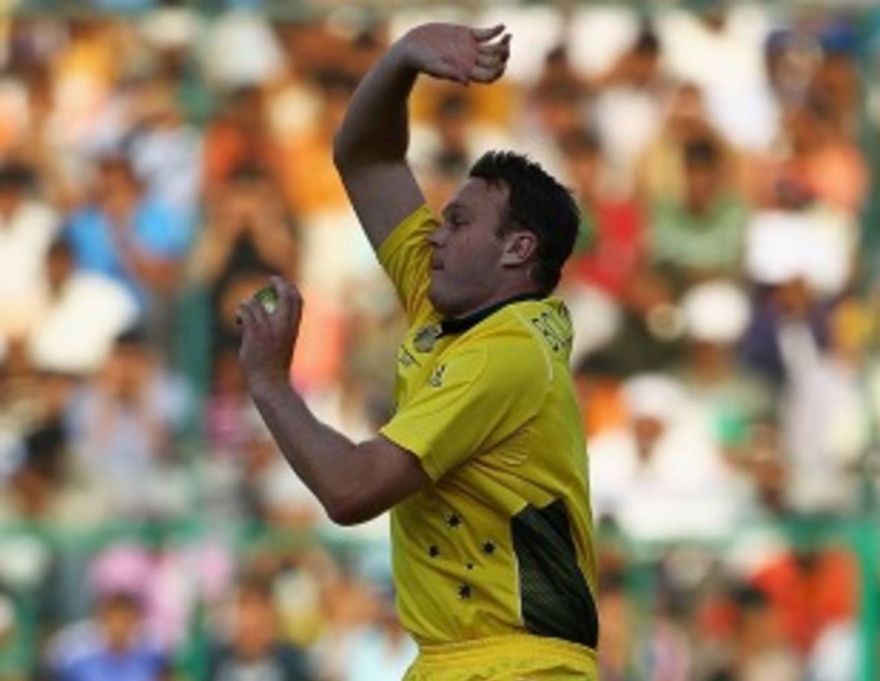 Doug Bollinger charges in, India v Australia, World Cup warm-up match, Bangalore, February 13, 2011 