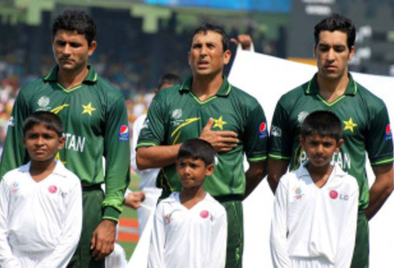 Pakistan players stand for their national anthem prior to the match, Sri Lanka v Pakistan, World Cup, Group A, Colombo, February 26, 2011