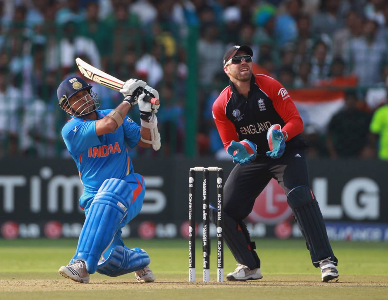 Sachin Tendulkar sends the ball into the stands during his 103-ball century, India v England, World Cup, Group B, Bangalore, February 27, 2011