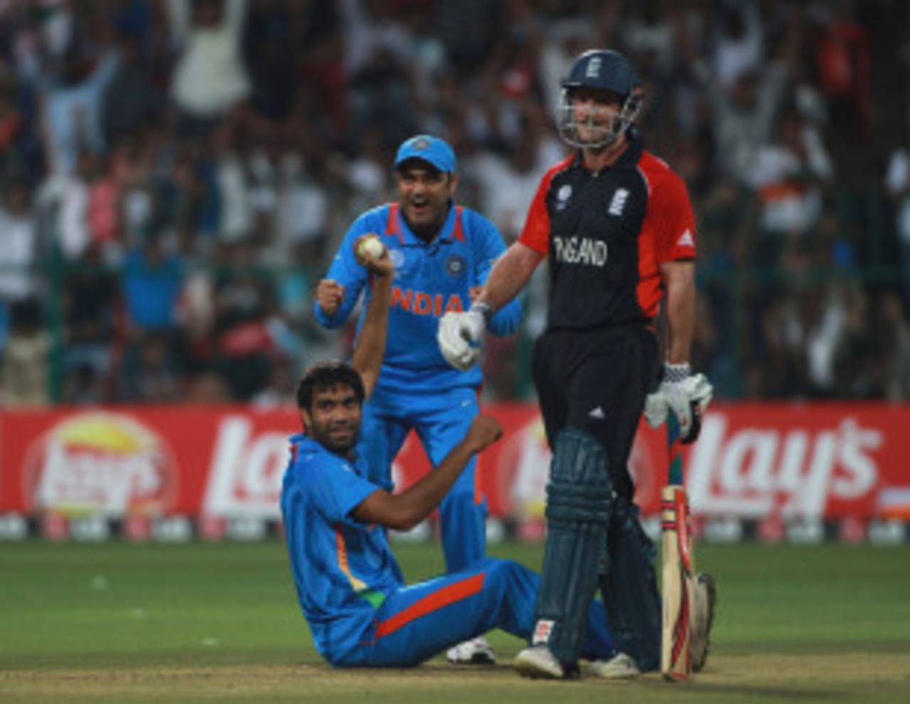 Munaf Patel is all smiles after dismissing Kevin Pietersen caught and bowled, India v England, World Cup, Group B, Bangalore, February 27, 2011