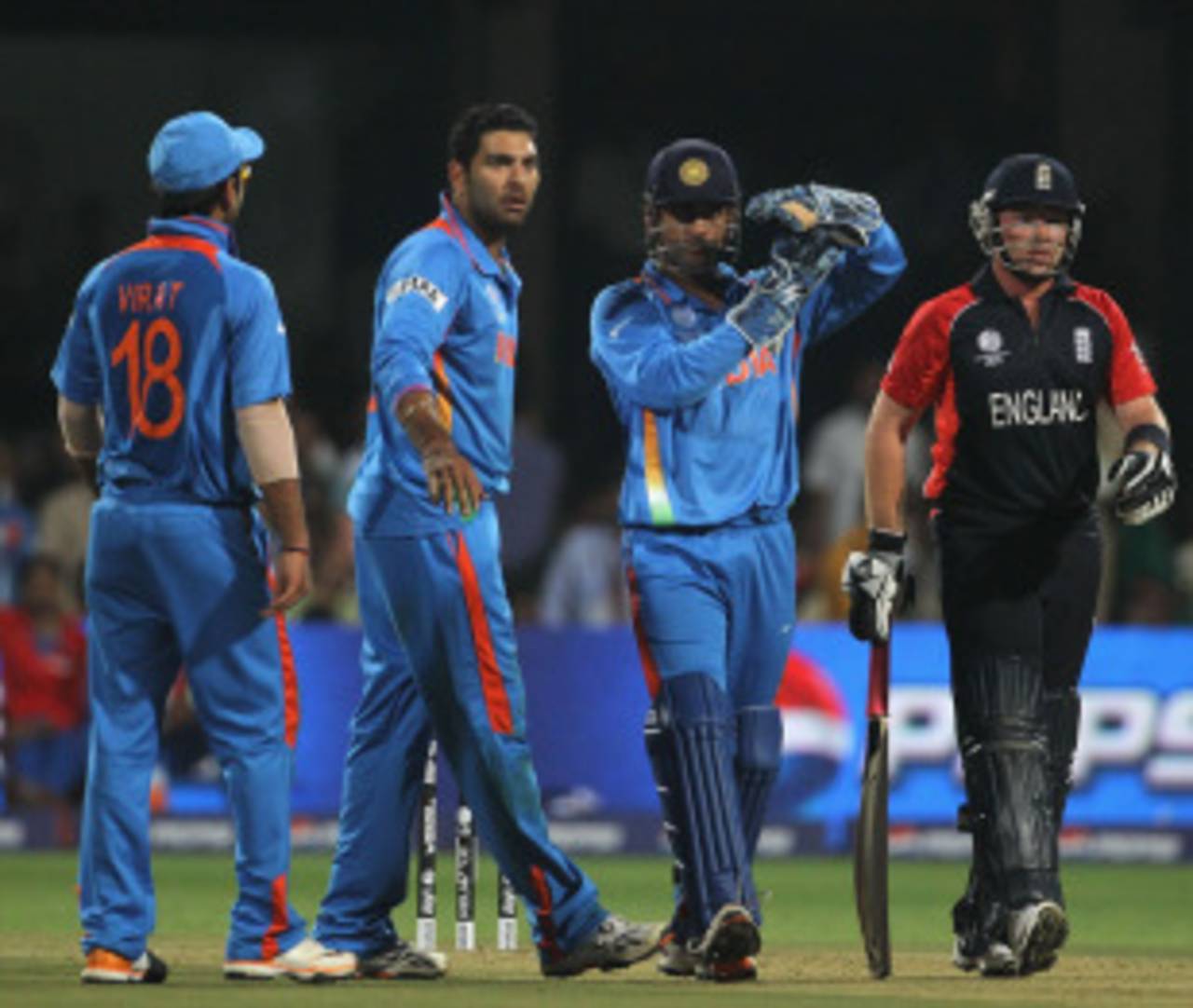 MS Dhoni calls for a referral when Ian Bell was struck on the pads by Yuvraj Singh, India v England, World Cup, Group B, Bangalore, February 27, 2011
