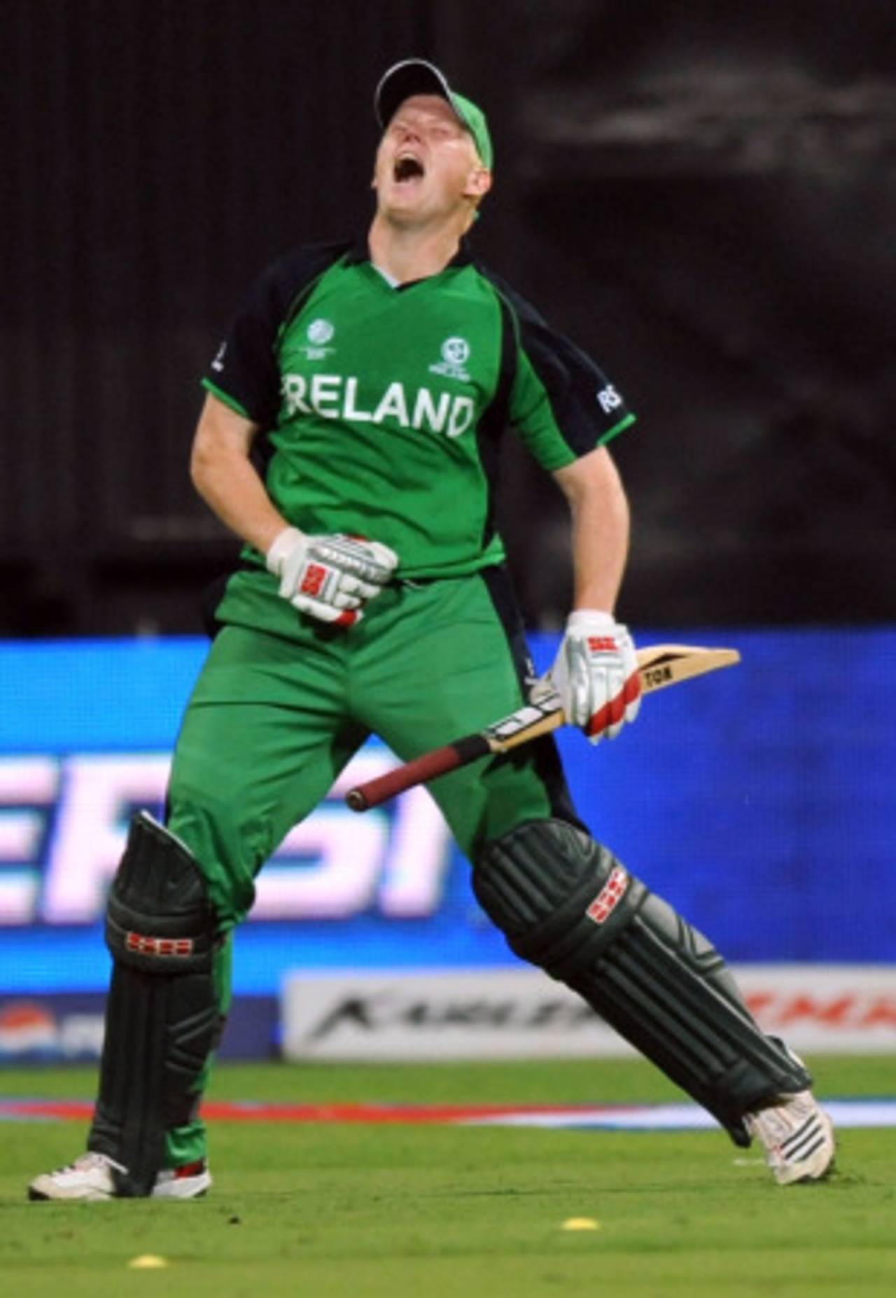 Kevin O'Brien roars with triumph after bringing up his 50-ball century, England v Ireland, World Cup 2011, Bangalore, March 2, 2011