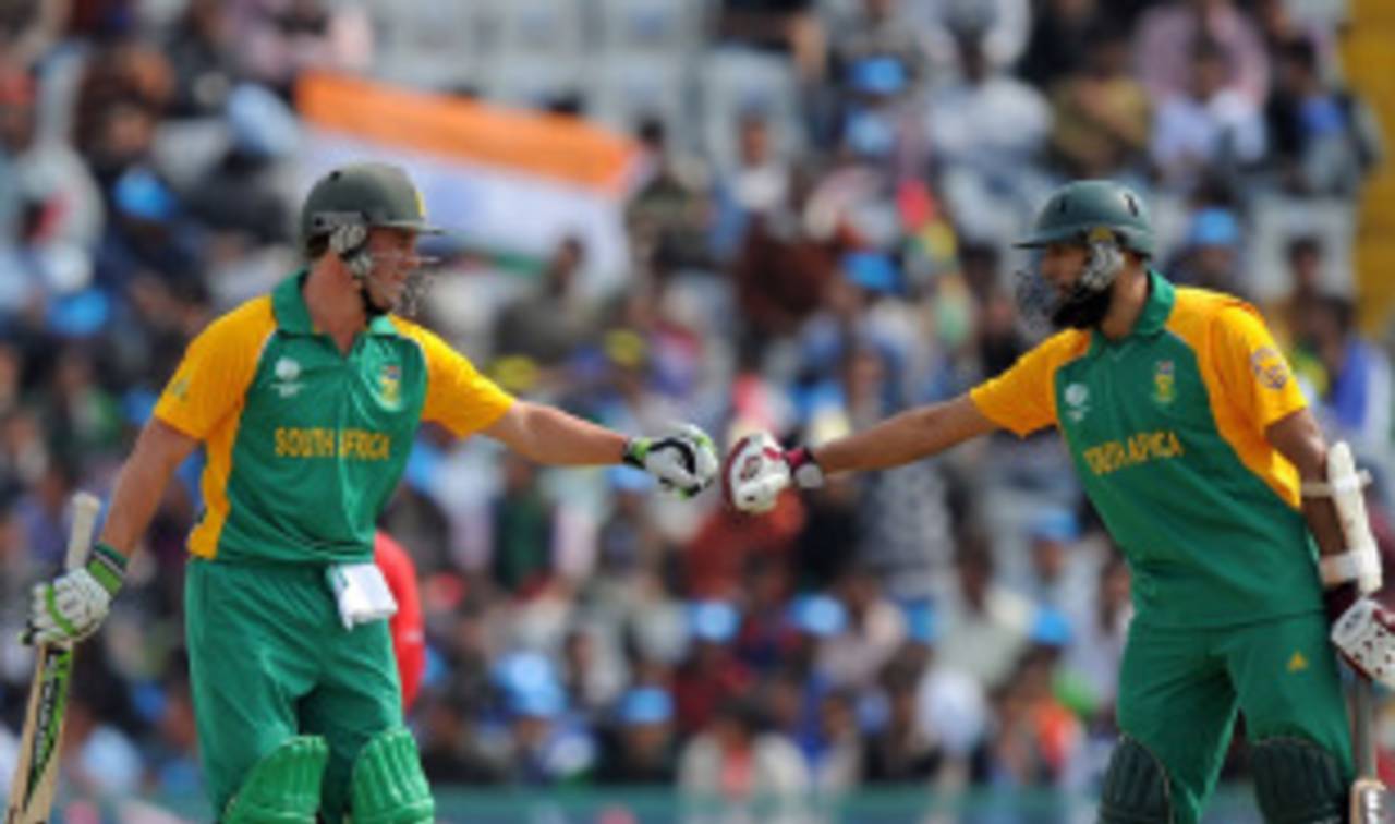 AB de Villiers and Hashim Amla knock gloves after putting up a record third-wicket partnership in Mohali, Netherlands v South Africa, World Cup 2011, Mohali, March 3, 2011