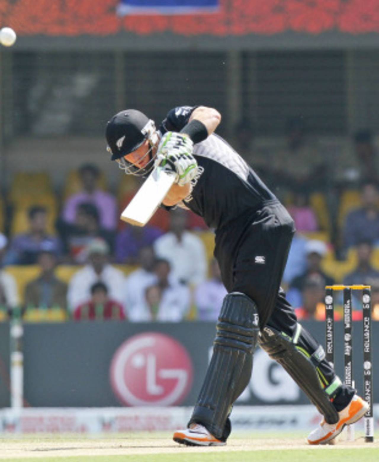 Martin Guptill drives in the air down the ground, New Zealand v Zimbabwe, Group A, World Cup 2011, Motera, March 4, 2011