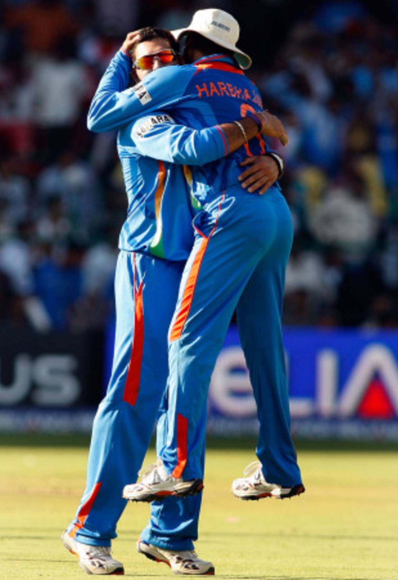 Harbhajan Singh embraces Yuvraj Singh after he got Kevin O'Brien, India v Ireland, Group B, World Cup 2011, Bangalore, March 6, 2011