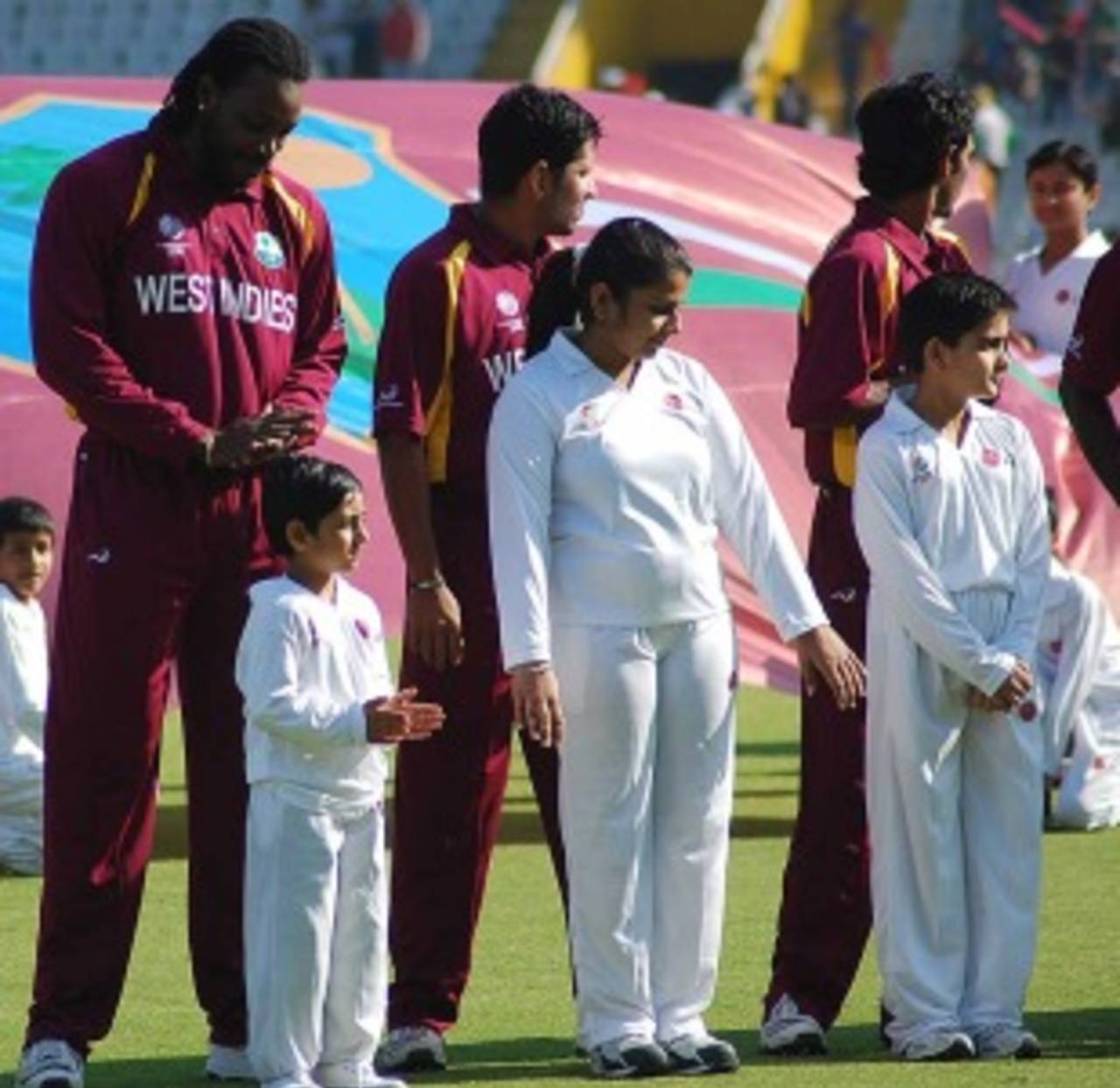 Chris Gayle comforts a nervous child, Ireland v West Indies, Group B, World Cup, Mohali, March 11, 2011