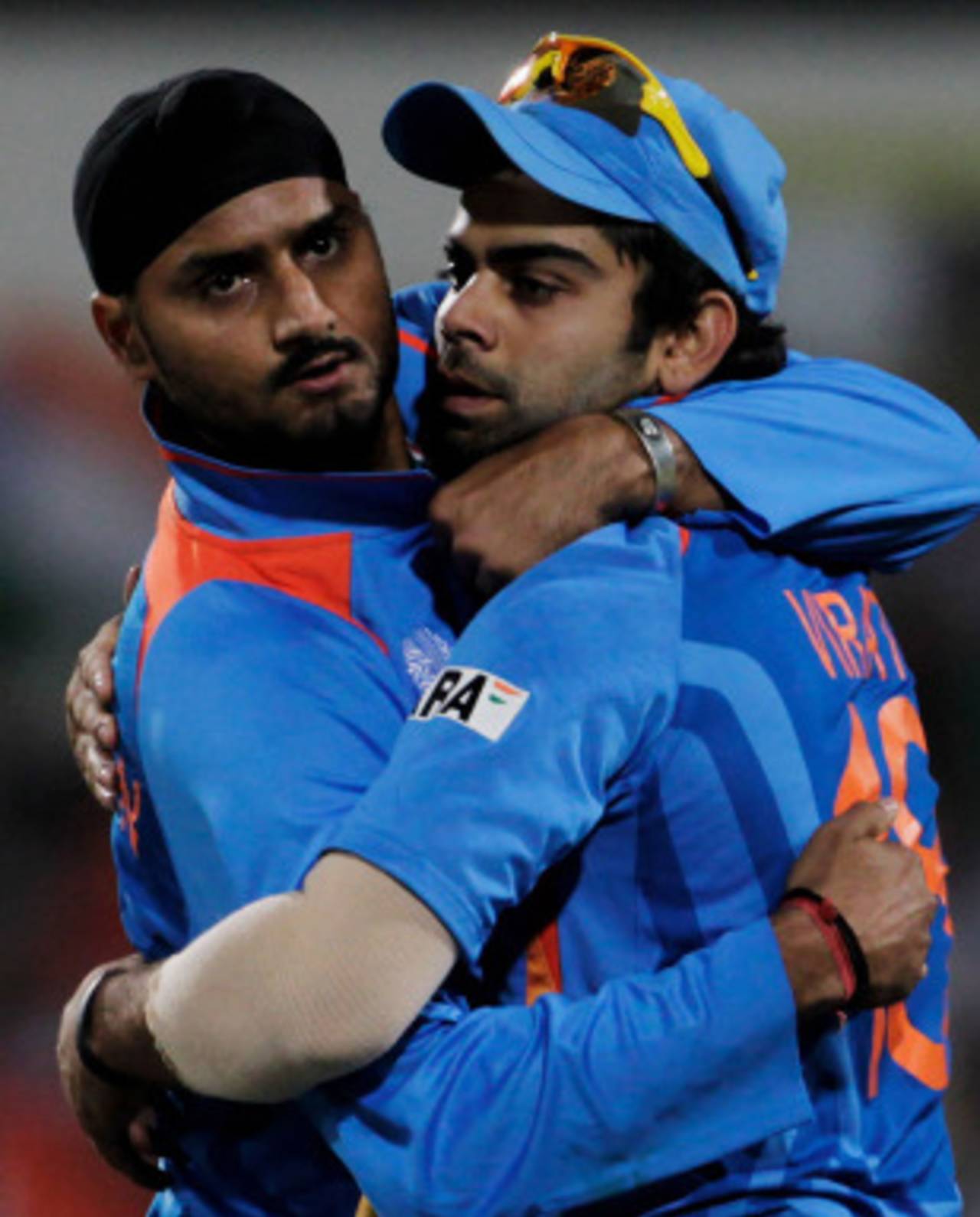 Harbhajan Singh and Virat Kohli embrace after combining to dismiss AB de Villiers, India v South Africa, Group B, World Cup, Nagpur, March 12, 2011