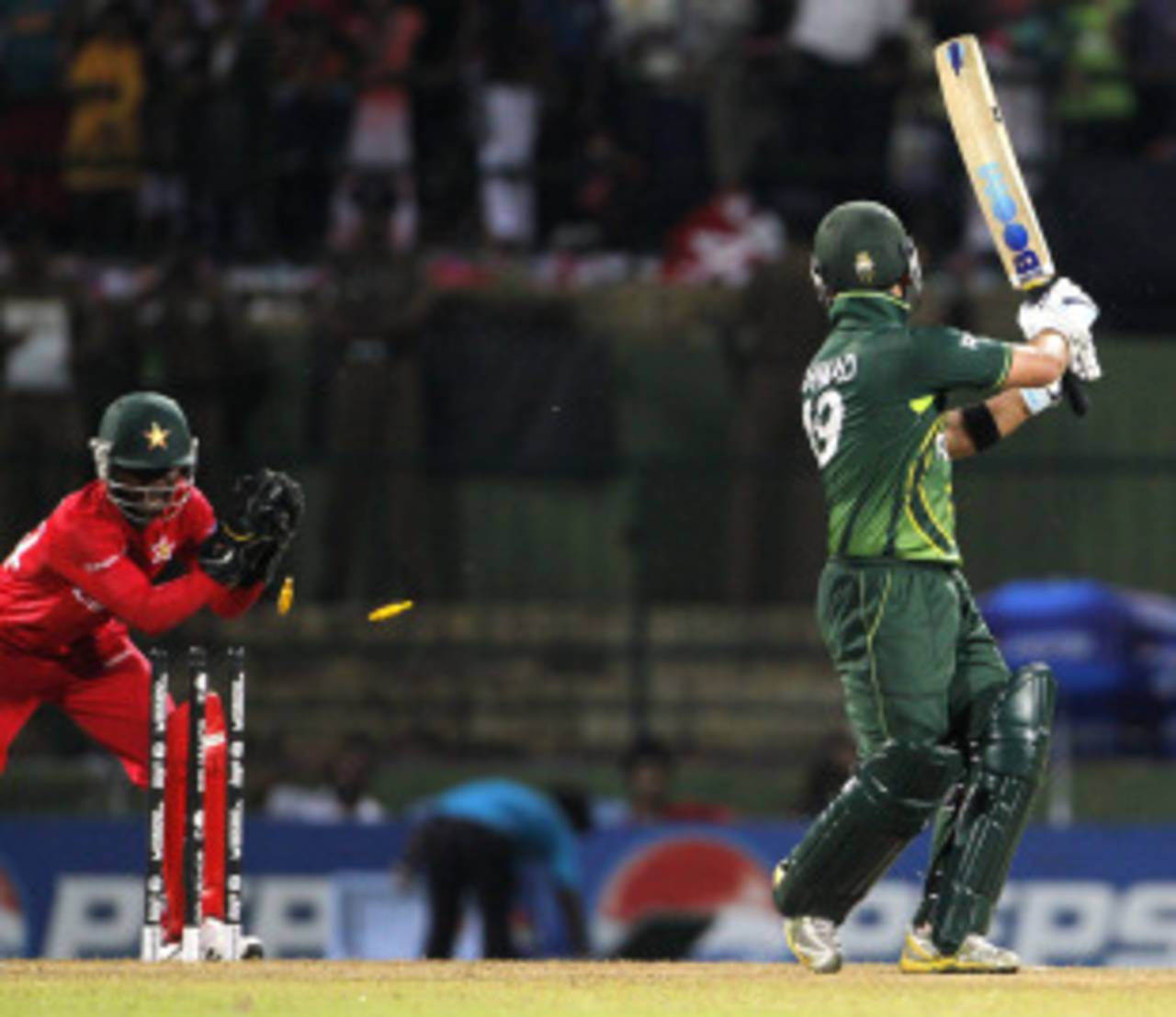 It was Ahmed Shehzad's turn to dance down the track to a left-arm spinner and be stumped&nbsp;&nbsp;&bull;&nbsp;&nbsp;Associated Press