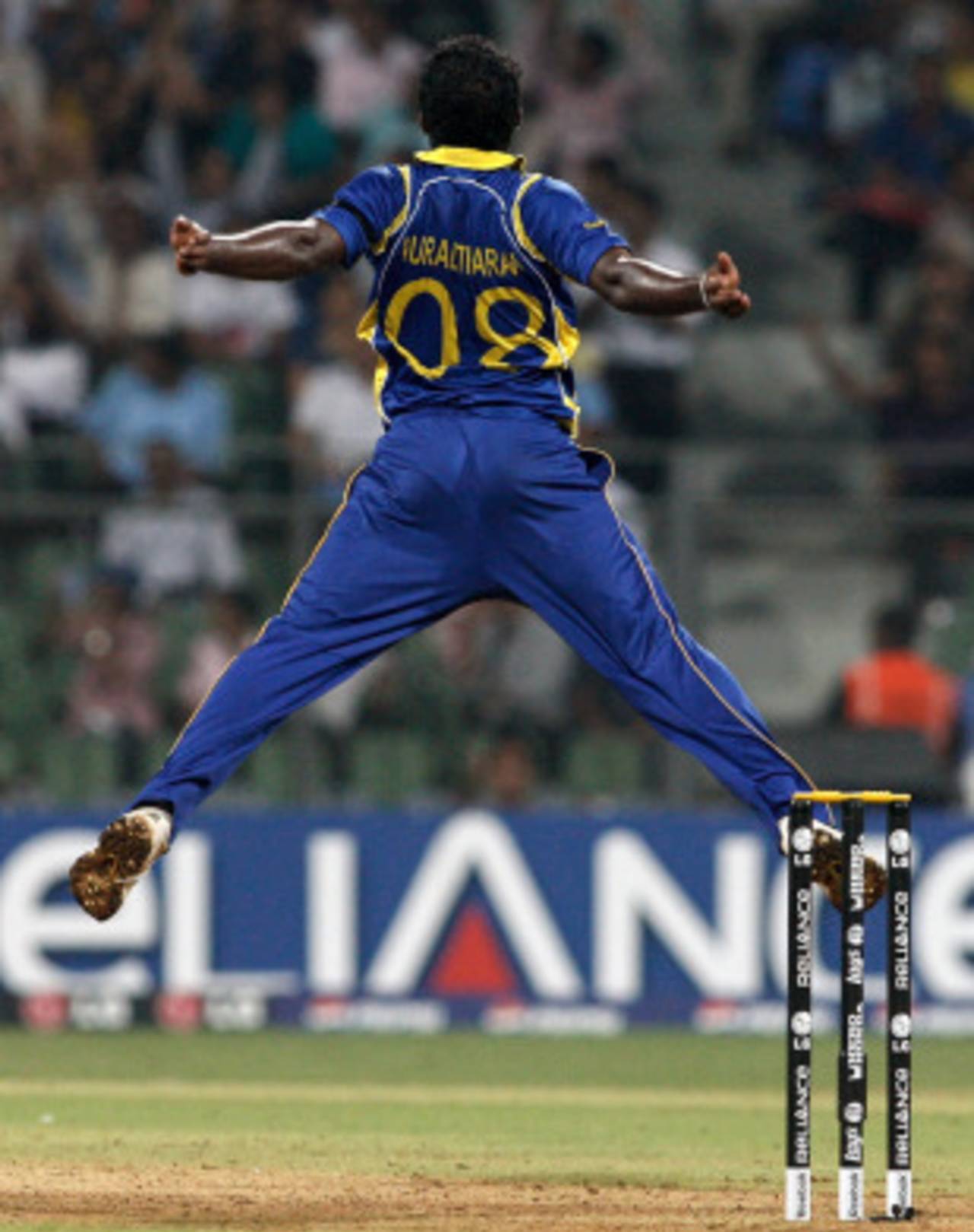 Muttiah Muralitharan takes off after catching Scott Styris, New Zealand v Sri Lanka, Group A, World Cup 2011, Mumbai, March 18, 2011