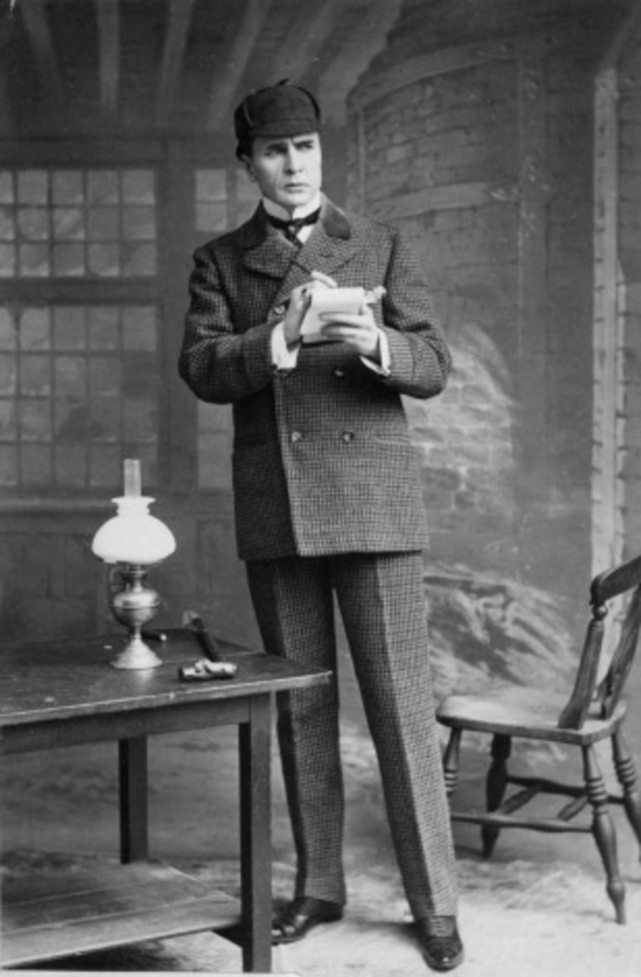 Actor William Gillette playing the detective Sherlock Holmes, 1899