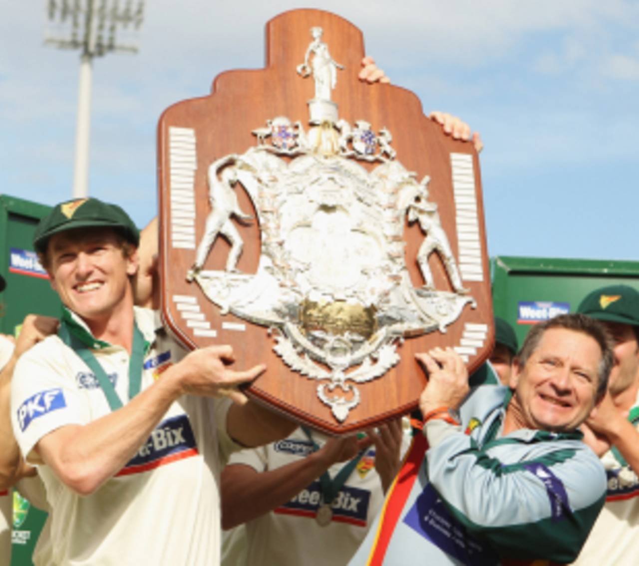 Victorious Tasmania captain George Bailey and coach Tim Coyle hold the Sheffield Shield aloft, Tasmania v New South Wales, Sheffield Shield final, Hobart, March 21, 2011