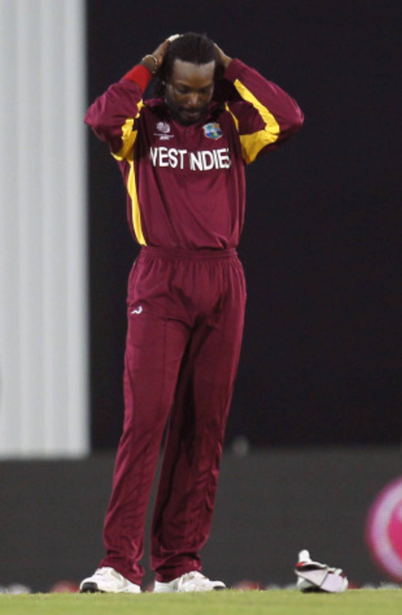 Chris Gayle looks down in dismay during West Indies' loss, West Indies v Pakistan, 1st quarter-final, World Cup 2011, March 23, 2011