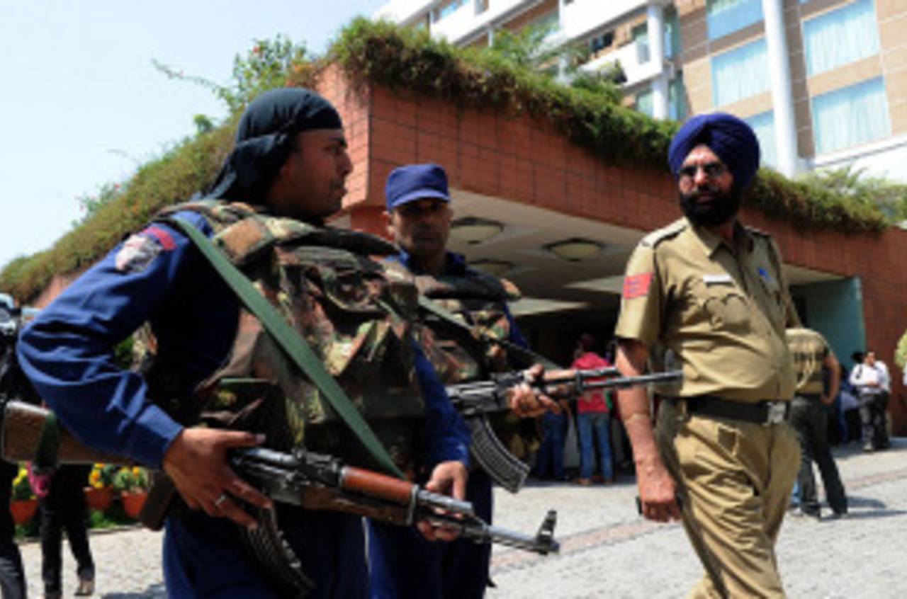 Security personnel stand guard outside the team hotel in Mohali ahead of the semi-final clash between India and Pakistan, Mohali, March 26, 2010