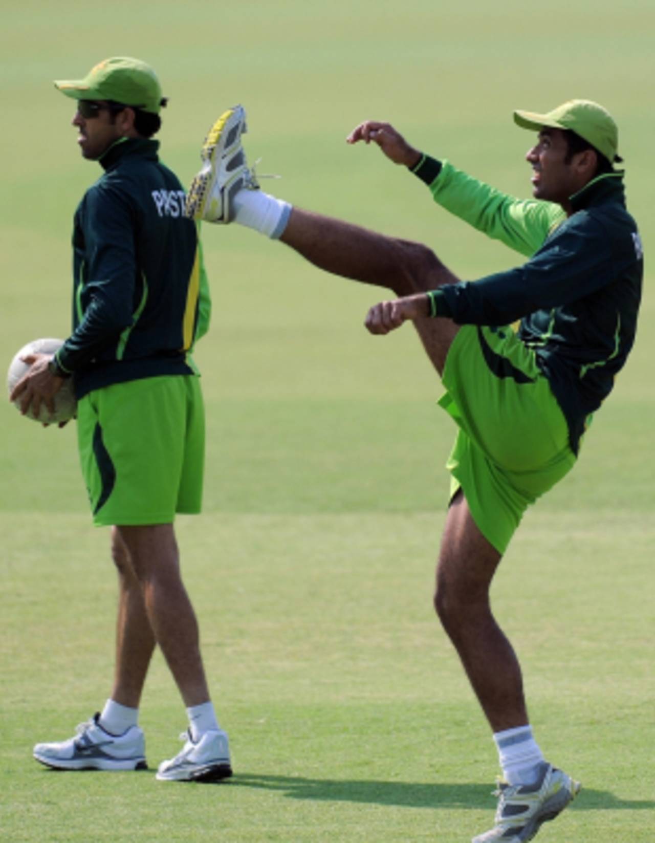 Umar Gul and Wahab Riaz warm up during Pakistan's training session, Mohali, World Cup 2011, March 26, 2011 