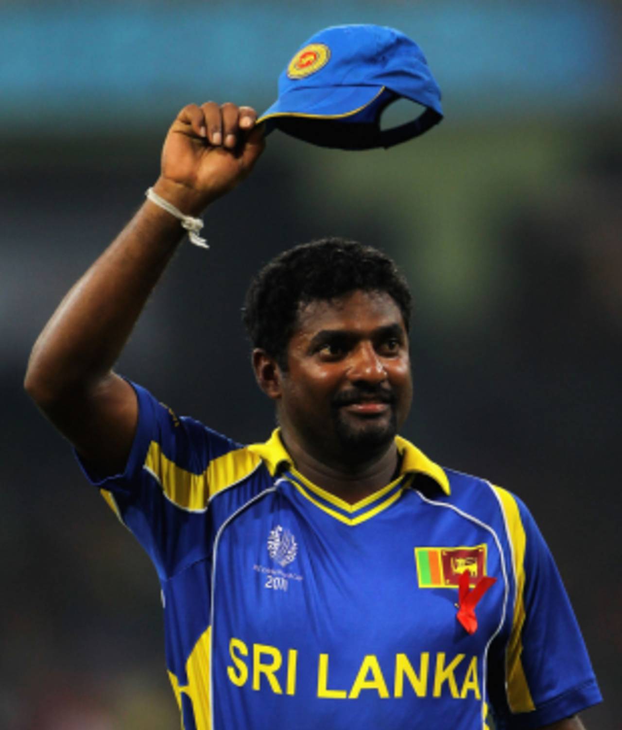 Muttiah Muralitharan salutes the crowd after completing his final spell in Sri Lanka, Sri Lanka v New Zealand, 1st semi-final, World Cup 2011, Colombo, March 29, 2011
