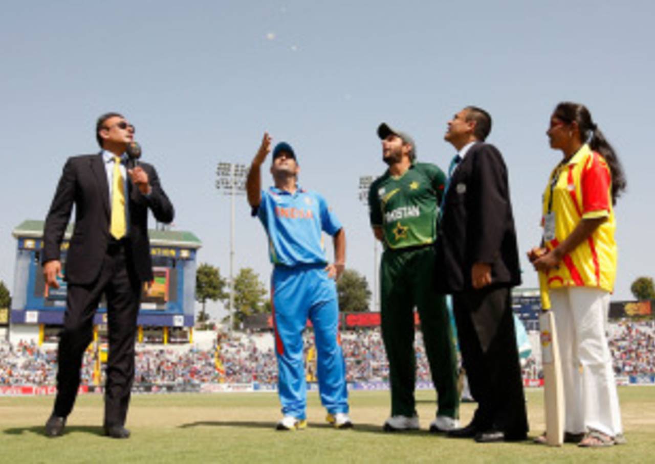 MS Dhoni spins the coin as the semi-final gets underway, India v Pakistan, 2nd semi-final, World Cup 2011, Mohali, March 30, 2011