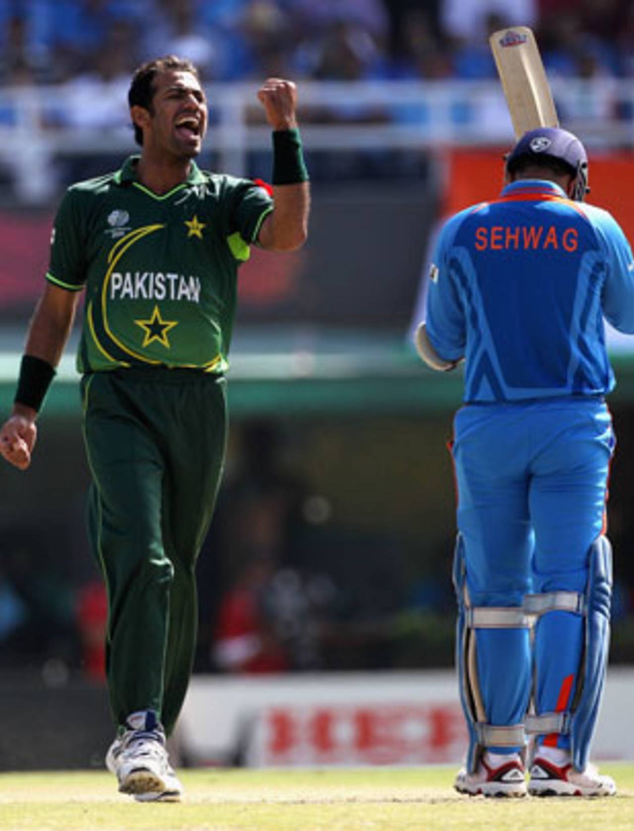 Wahab Riaz celebrates as Virender Sehwag walks off, India v Pakistan, 2nd semi-final, World Cup 2011, Mohali, March 30, 2011
