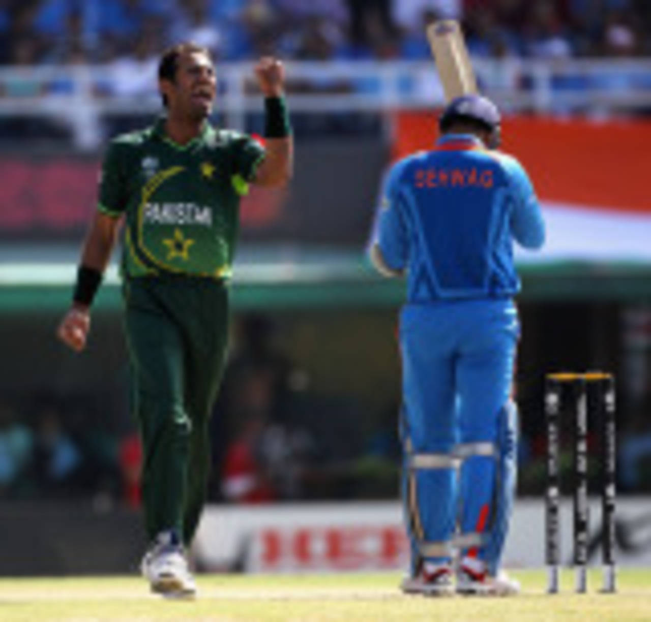 Wahab Riaz celebrates as Virender Sehwag walks off, India v Pakistan, 2nd semi-final, World Cup 2011, Mohali, March 30, 2011