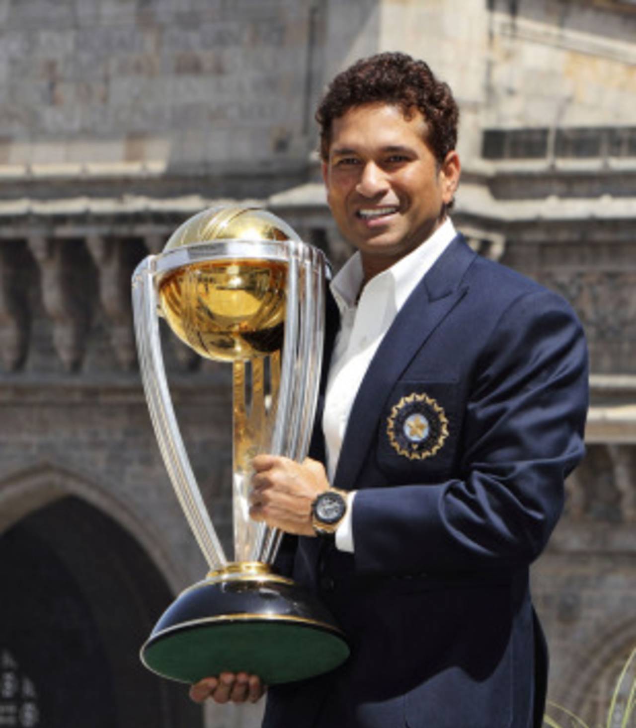 Sachin Tendulkar stands with the cup he has dreamed of holding for 24 years&nbsp;&nbsp;&bull;&nbsp;&nbsp;Associated Press