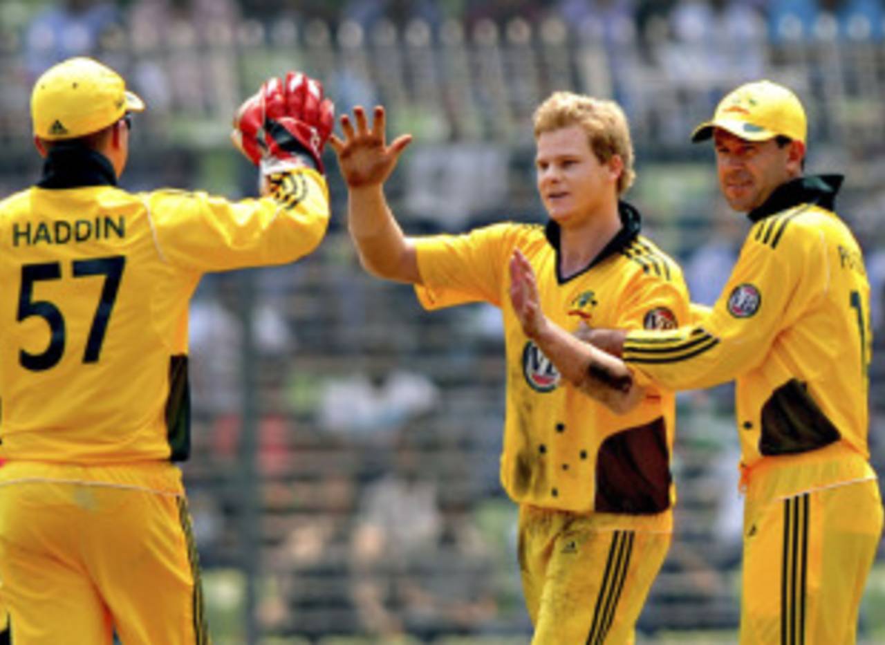Team-mates congratulate Steven Smith after his dismissal of Shahriar Nafees, Bangladesh v Australia, 2nd ODI, Mirpur, April 11, 2011