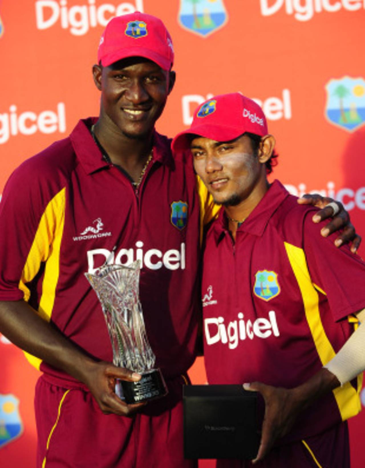 West Indies captain Darren Sammy and Man of the Match Devendra Bishoo pose with the silverware, West Indies v Pakistan, Only Twenty20, St Lucia, April 21, 2010
