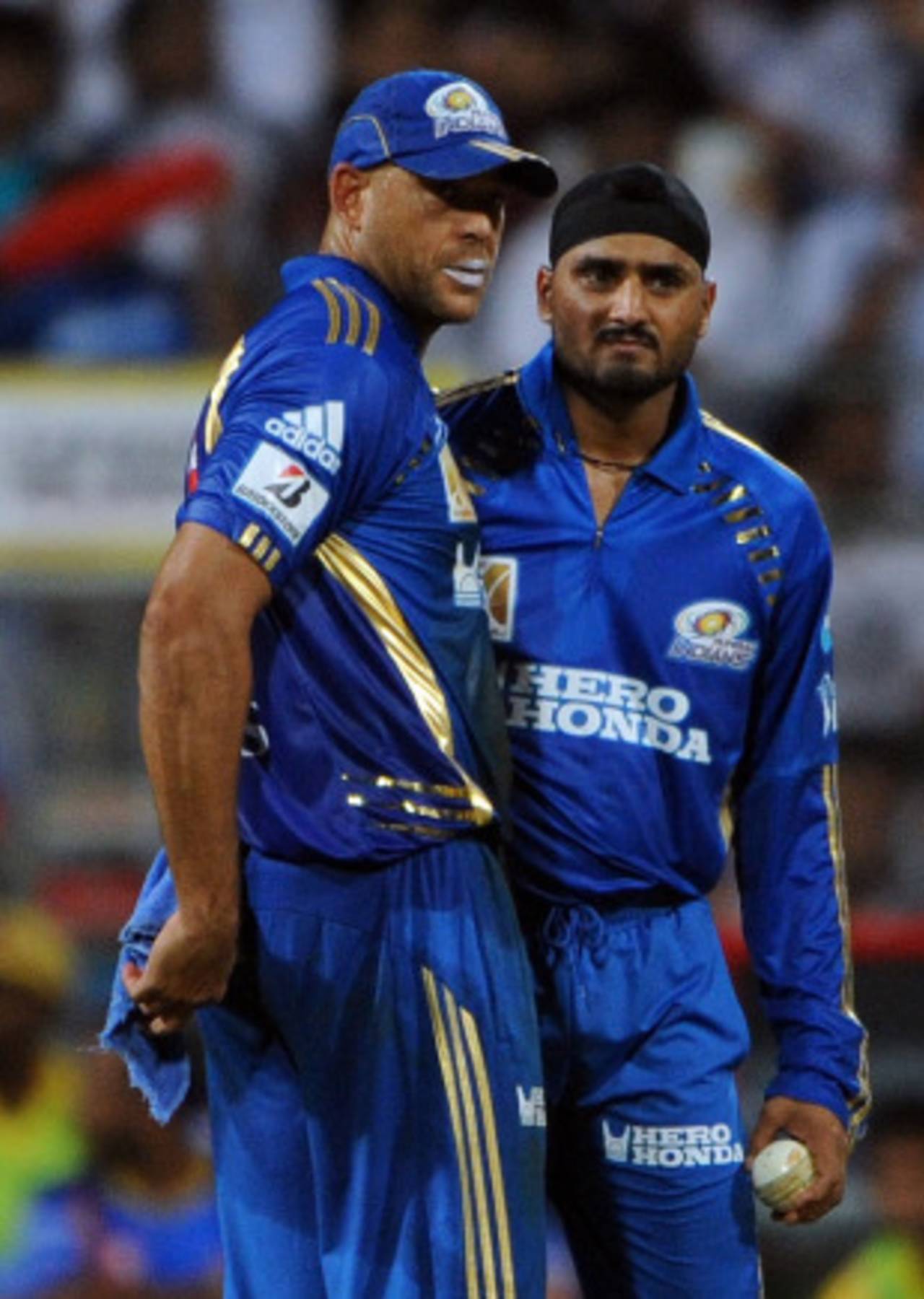 Andrew Symonds and Harbhajan Singh have a chat, Mumbai Indians v Chennai Super Kings, IPL 2011, Mumbai, April 22, 2011
