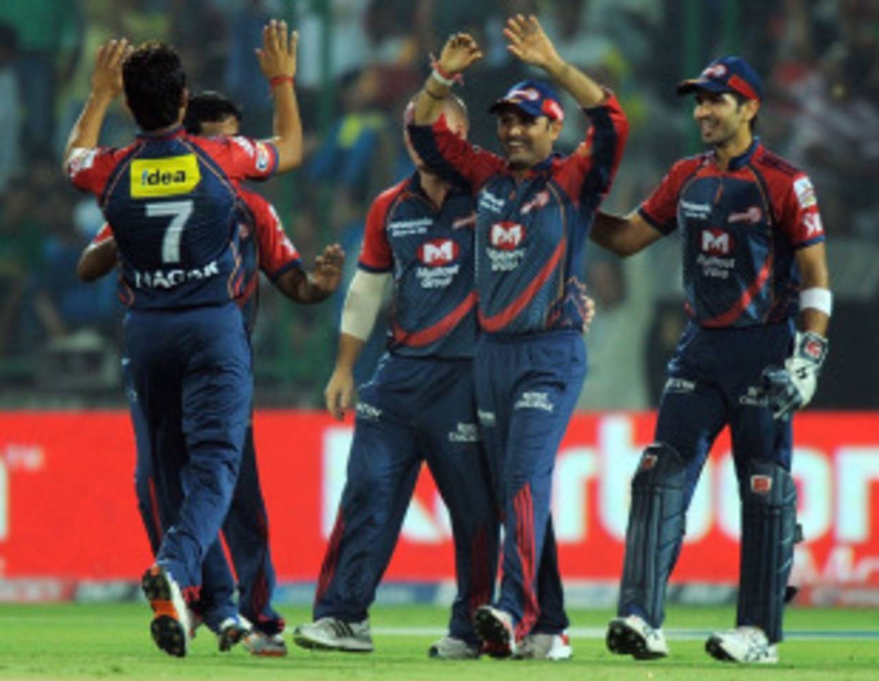 Virender Sehwag is pleased after taking a catch to dismiss Dinesh Karthik, Delhi Daredevils v Kings XI Punjab, IPL 2011, Delhi, April 23, 2011