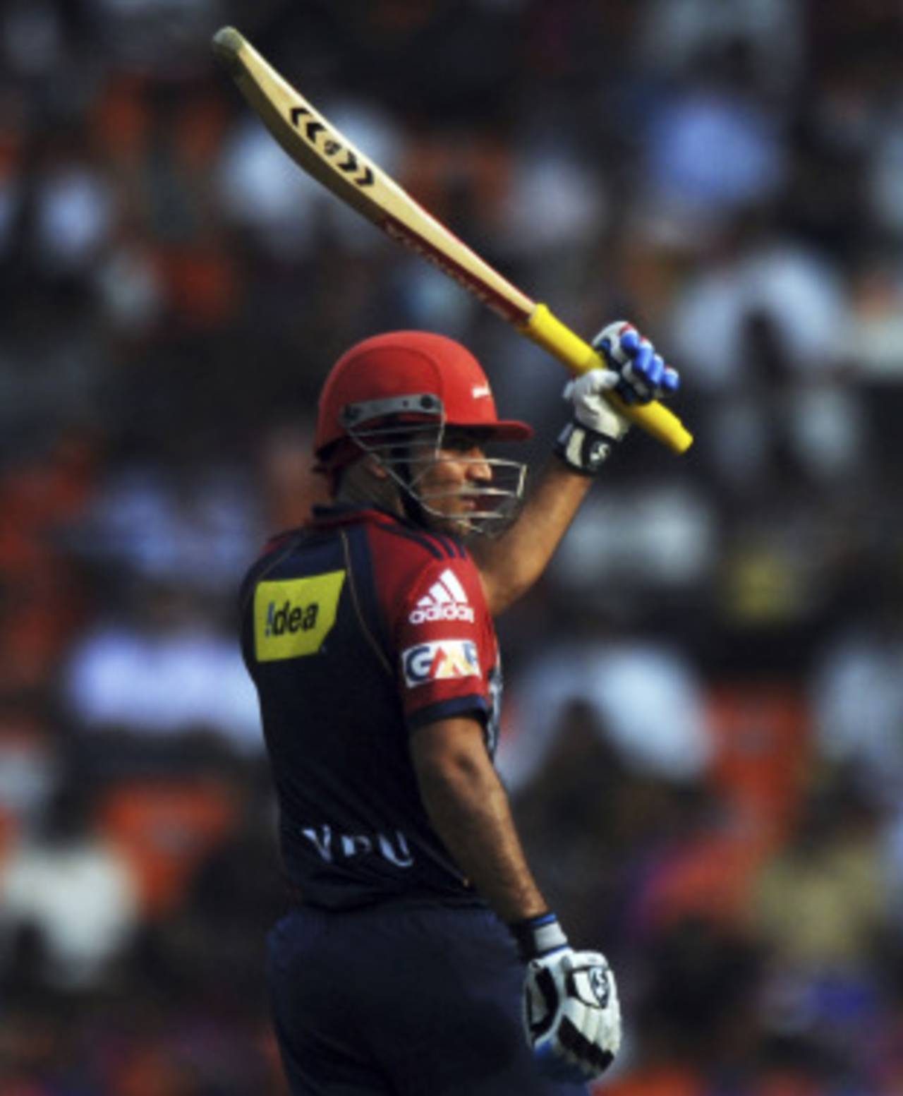 Virender Sehwag raises his bat after getting to his half-century, Kochi Tuskers Kerala v Delhi Daredevils, IPL 2011, Kochi, April 30, 2011