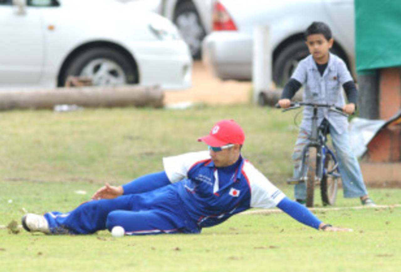 An onlooker watches Japan in the field, Botswana v Japan, ICC World Cricket League Division Seven, Gaborone, Botswana, May 2, 2011 