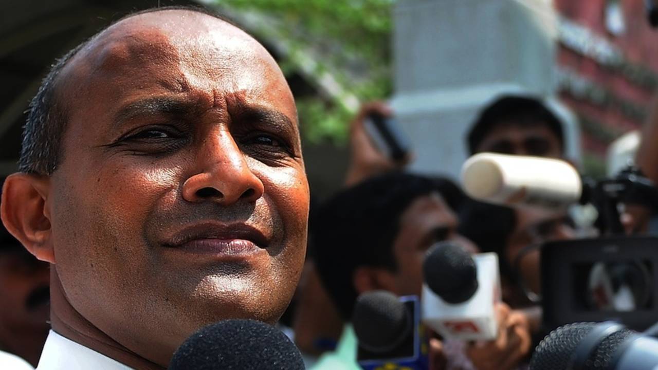 Hashan Tillakaratne speaks to reporters in Colombo, May 3, 2011
