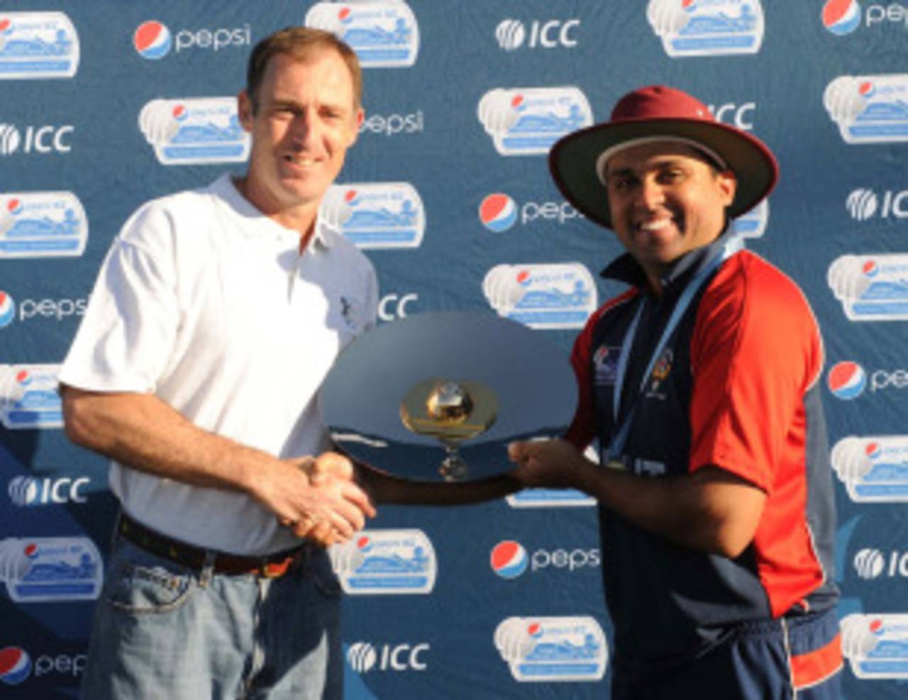 ICC and Bermuda Cricket director Neil Speight presents the WCL Division 7 trophy to Hisham Mirza, Kuwait v Nigeria , World Cricket League Division 7 Final, Gaborone, May 8, 2011