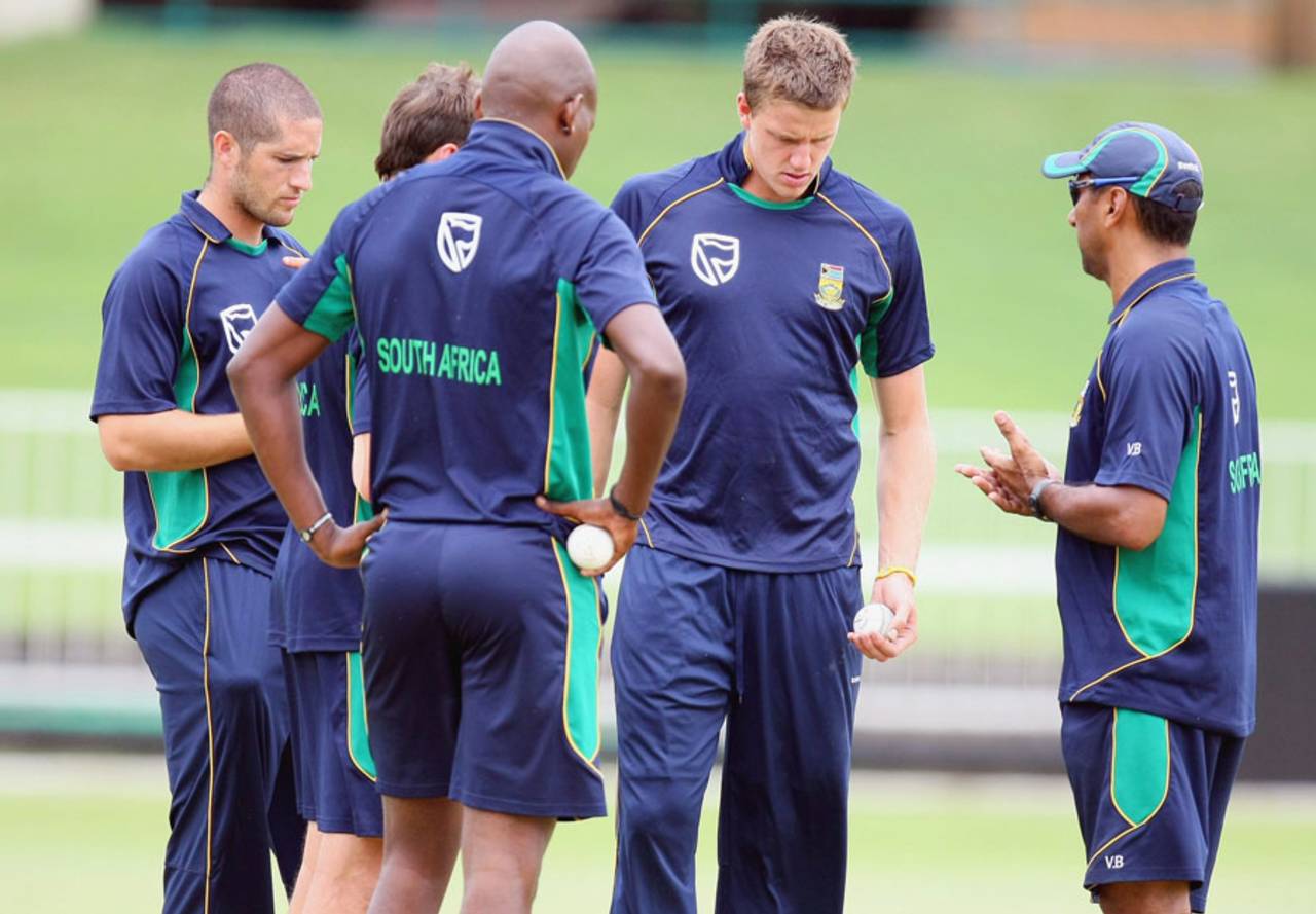 Vincent Barnes, South Africa's assistant coach, talks to the fast bowlers during nets, Durban, January 11, 2011