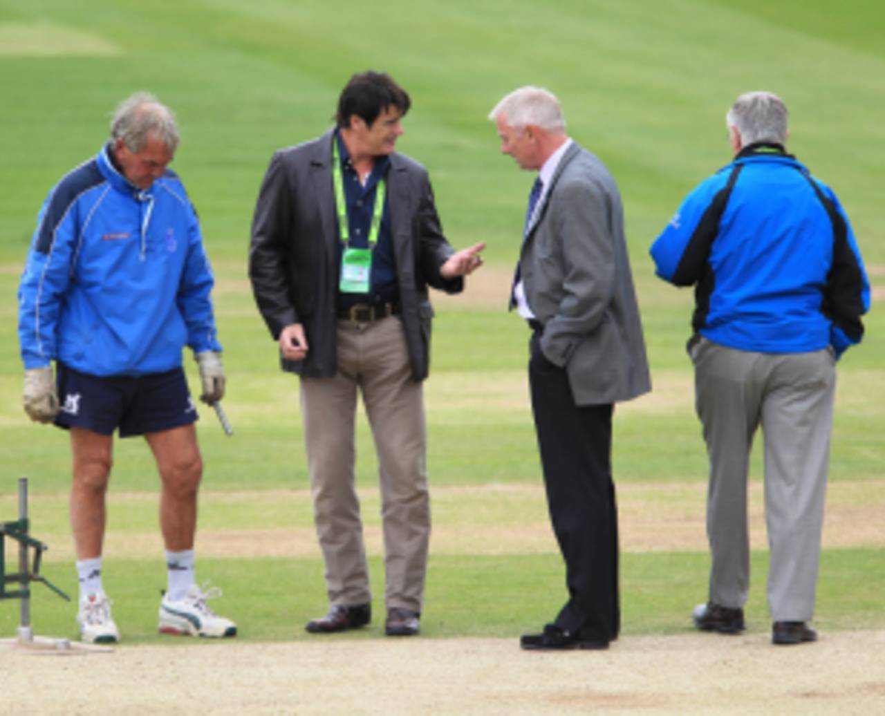 Warwickshire's Head Groundsman Steve Rouse and ECB officials check the wicket at Edgbaston, Warwickshire v Worcestershire, County Championship, Division One, Edgbaston, May 13, 2011
