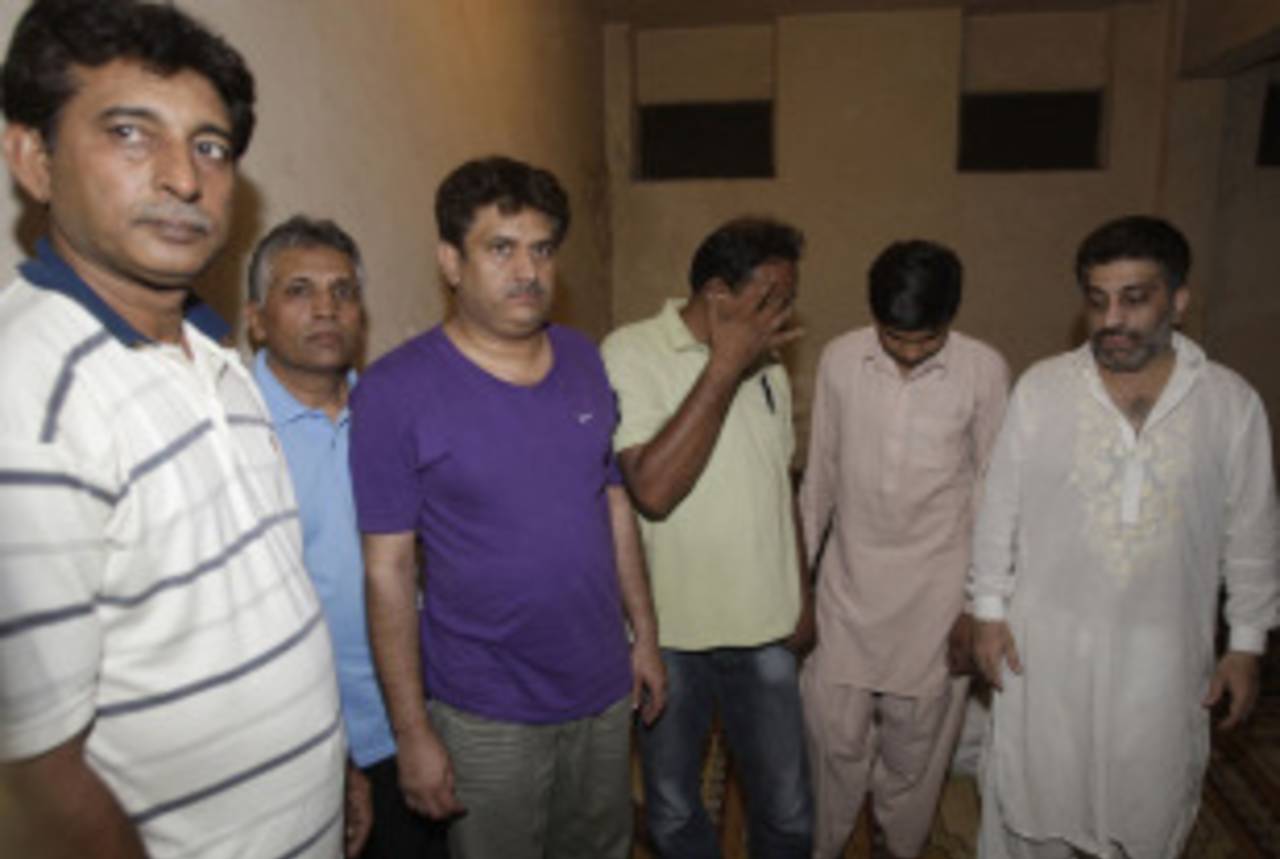 Akram Raza (far left) was one of seven men arrested for illegal betting on Sunday&nbsp;&nbsp;&bull;&nbsp;&nbsp;Associated Press