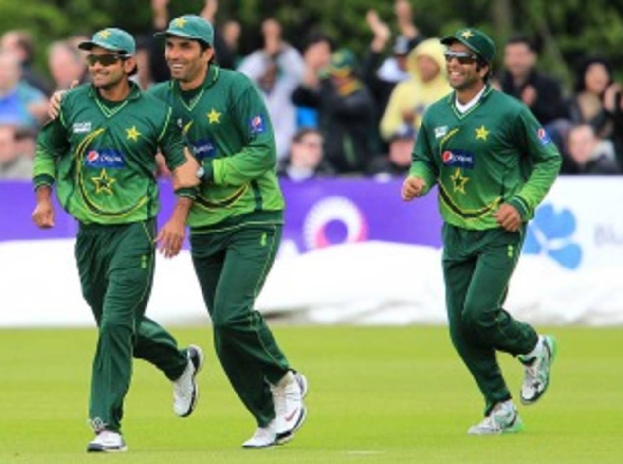 Mohammad Hafeez, Misbah-ul-Haq and Taufeeq Umar celebrate a wicket, Ireland v Pakistan, 1st ODI, Belfast, May 28, 2011