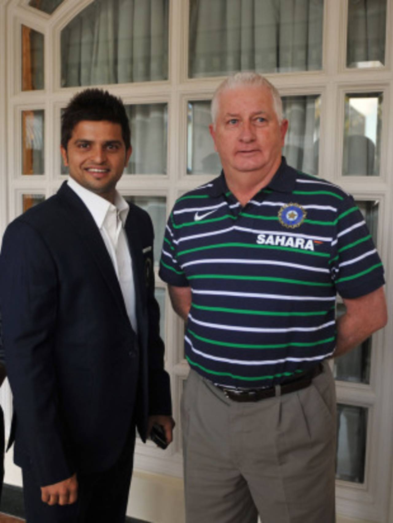 Suresh Raina and Duncan Fletcher prior to India's departure, Mumbai, May 31, 2011