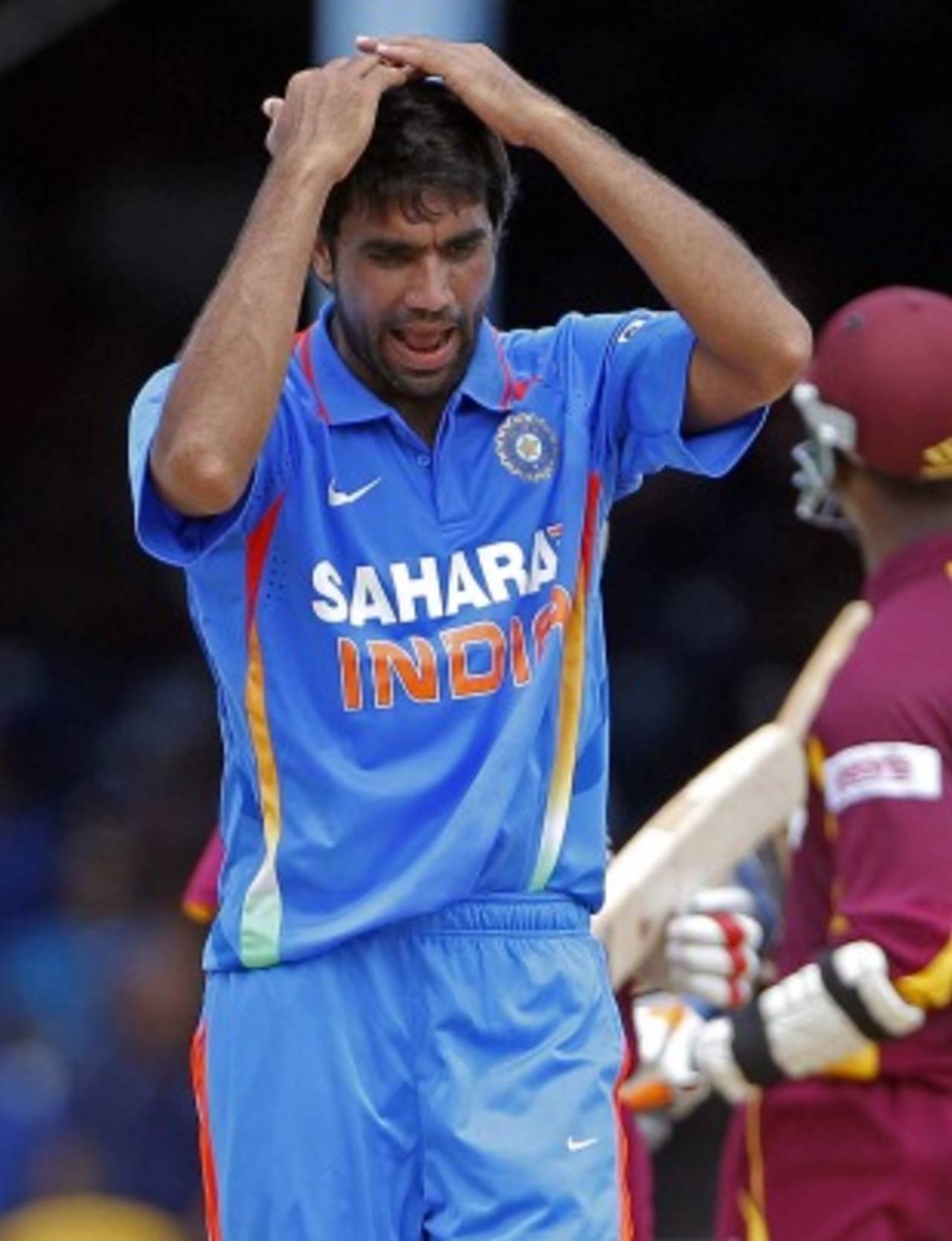 Munaf Patel reacts after bowling a wayward delivery, West Indies v India, 1st ODI, Trinidad, June 6, 2011