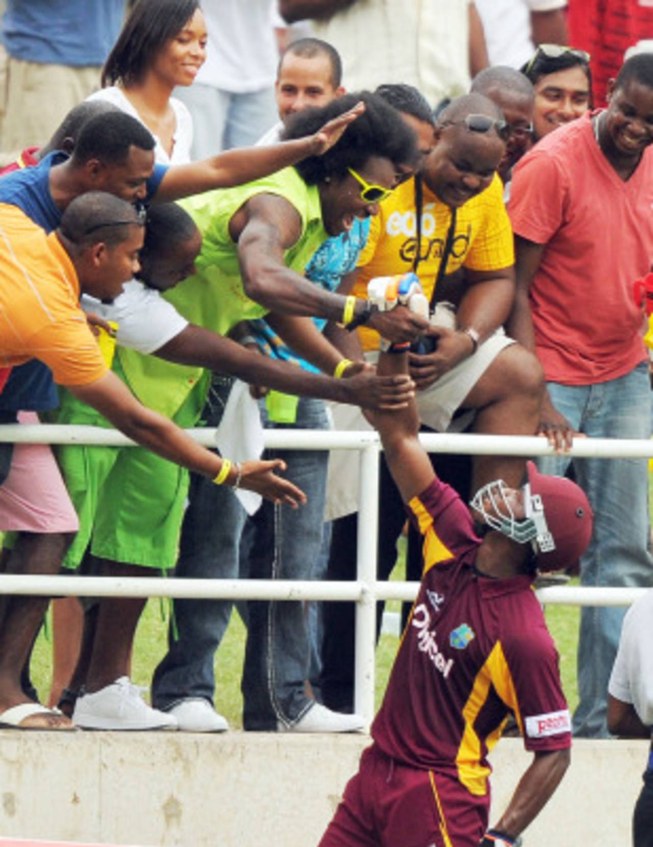 Marlon Samuels celebrates the win with Chris Gayle&nbsp;&nbsp;&bull;&nbsp;&nbsp;AFP